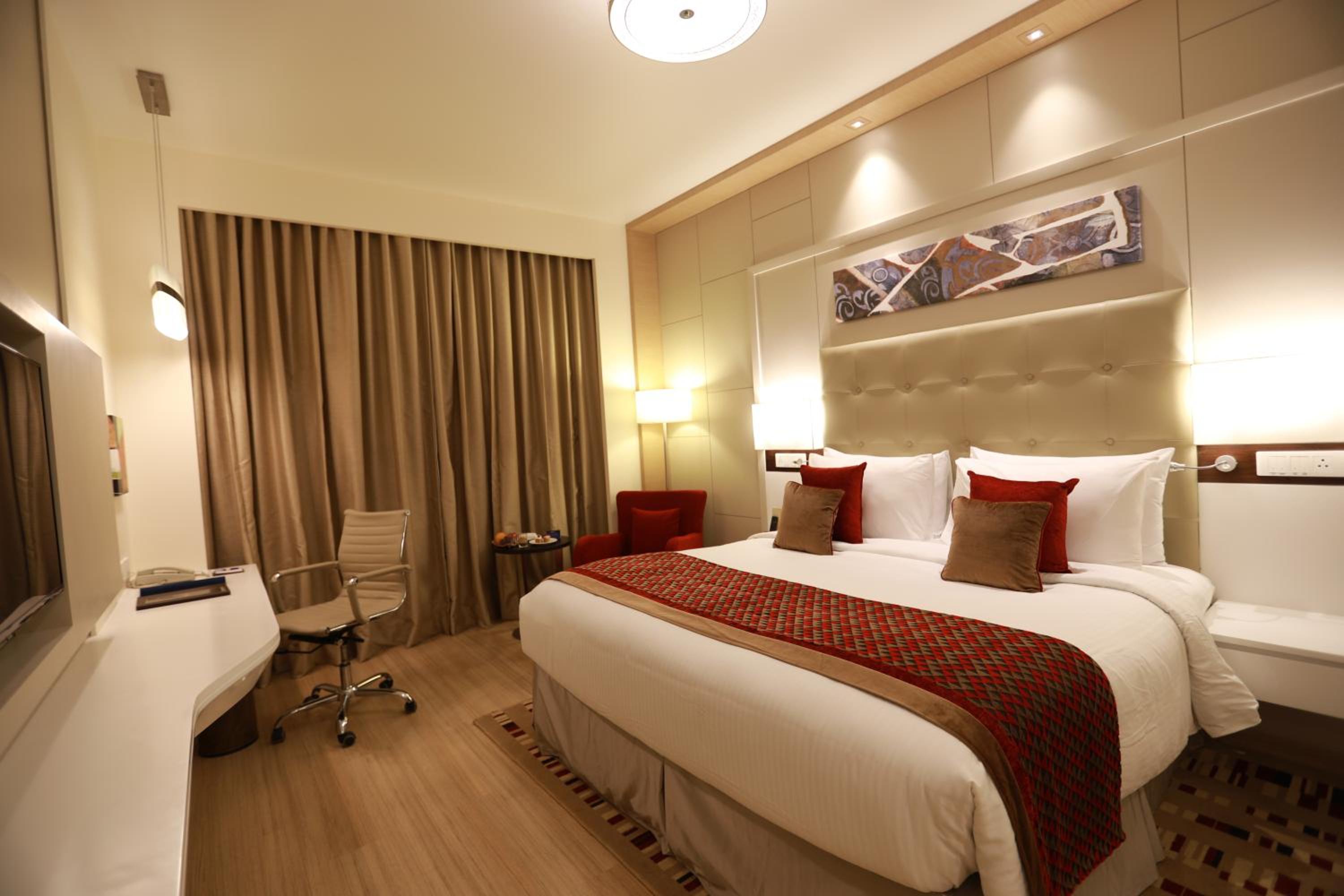 Business Class Room with INR 1000 beverage credit (min. spend ₹3,500), 20% off on F&B , 2 beers per stay and access to Business Lounge