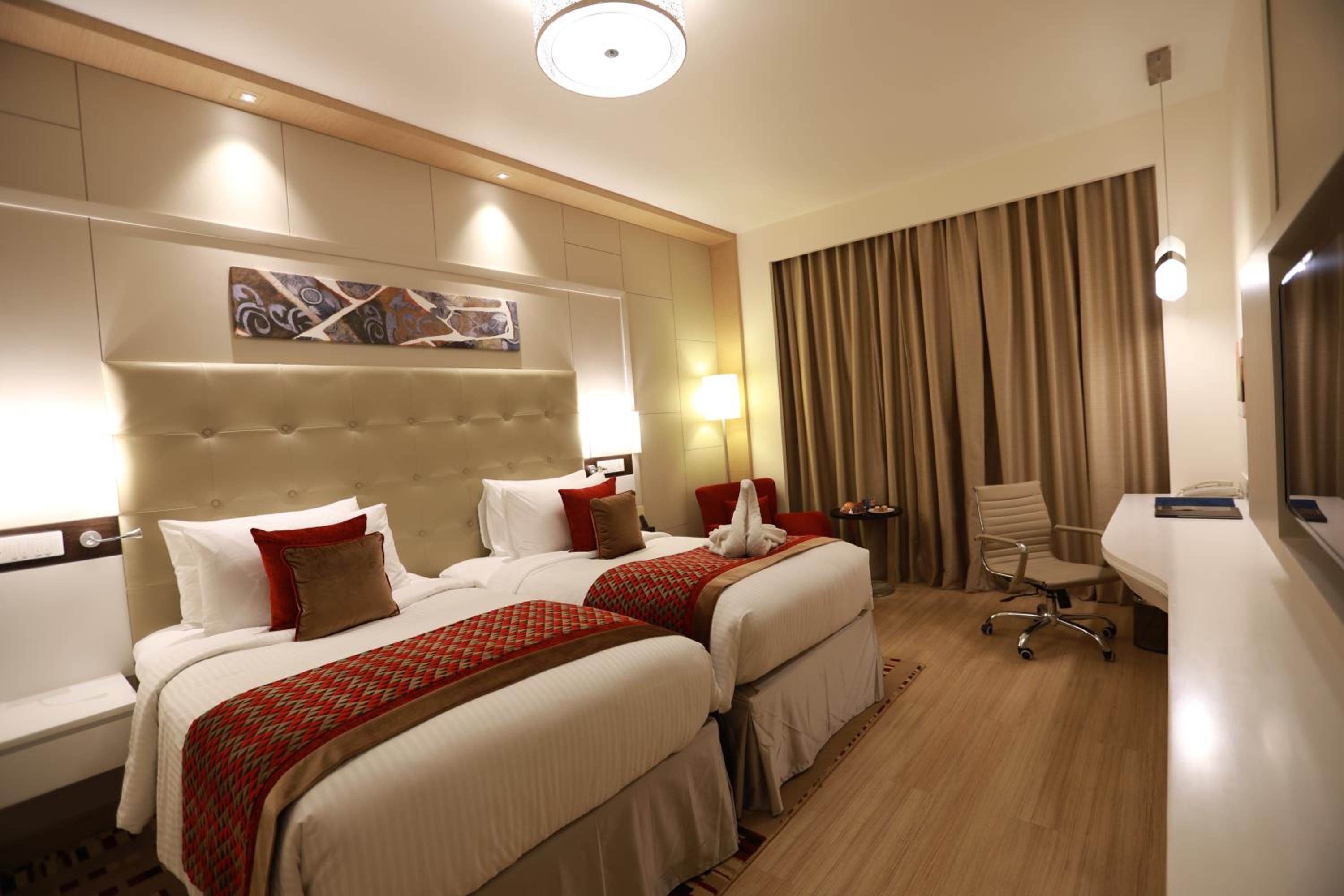 Business Class Room with INR 1000 beverage credit (min. spend ₹3,500), 20% off on F&B , 2 beers per stay and access to Business Lounge