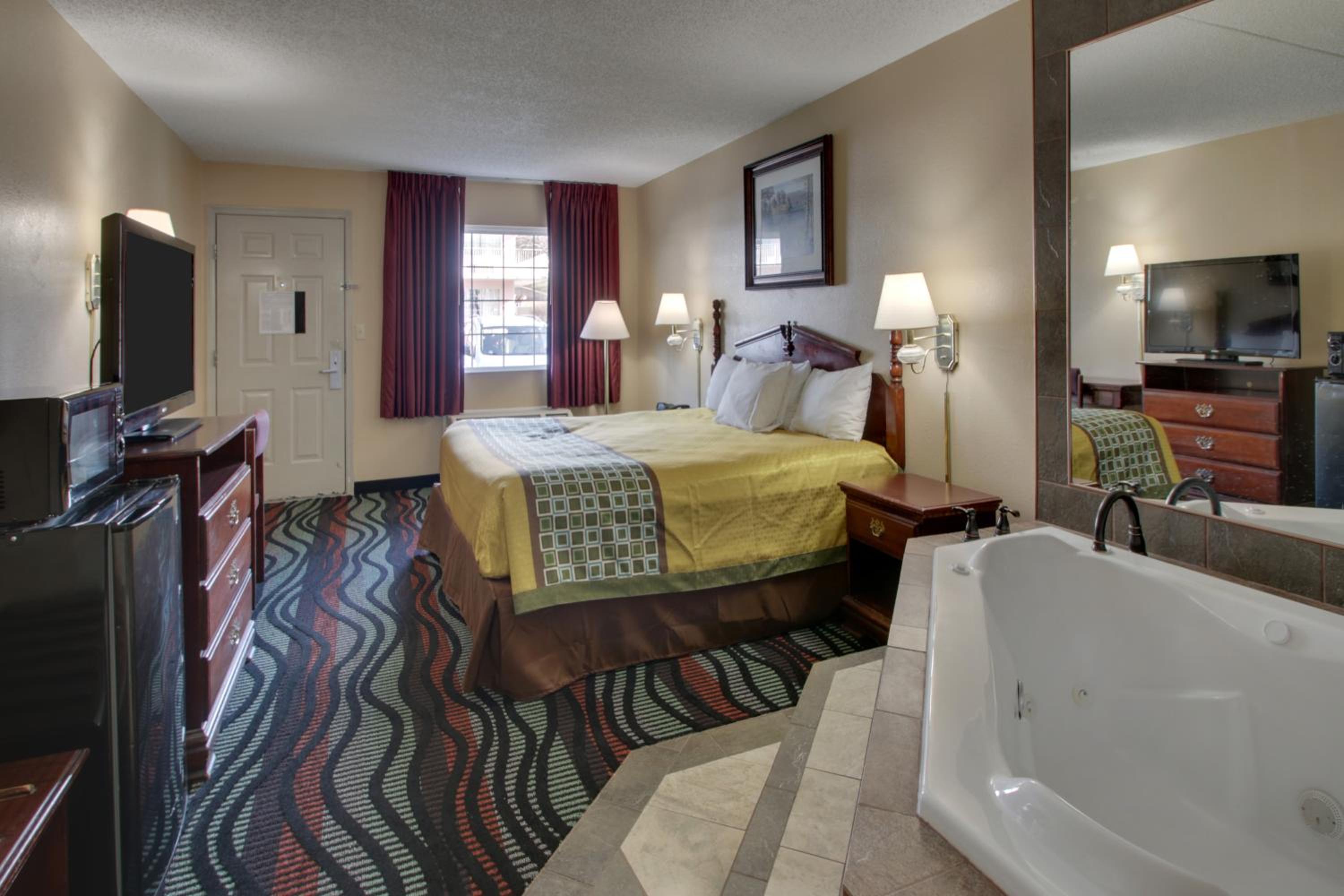  Plush King Bed with Jacuzzi (Ground Level) - Photo 8