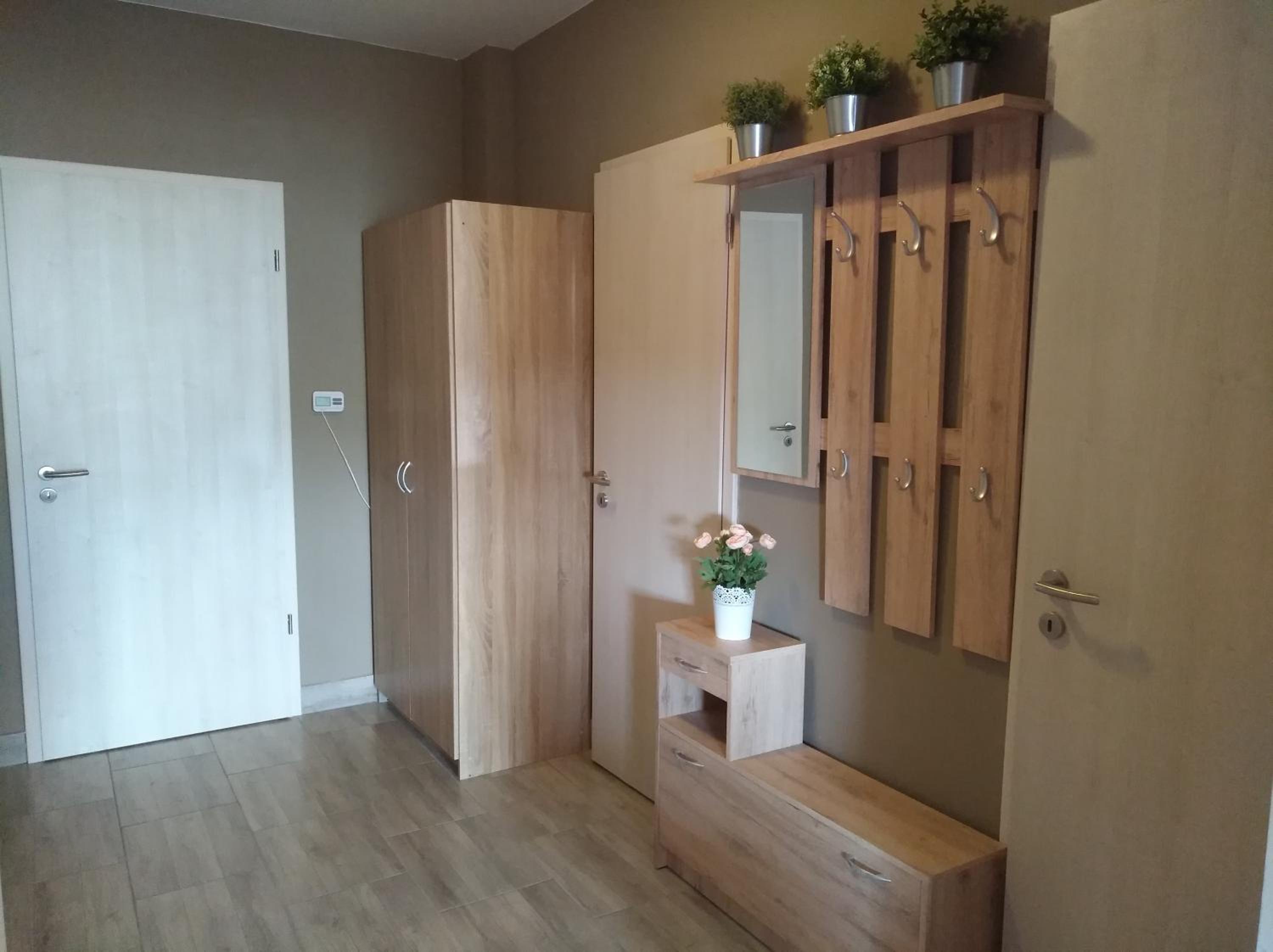 Three-Bedroom Apartment with Balcony - Photo 14