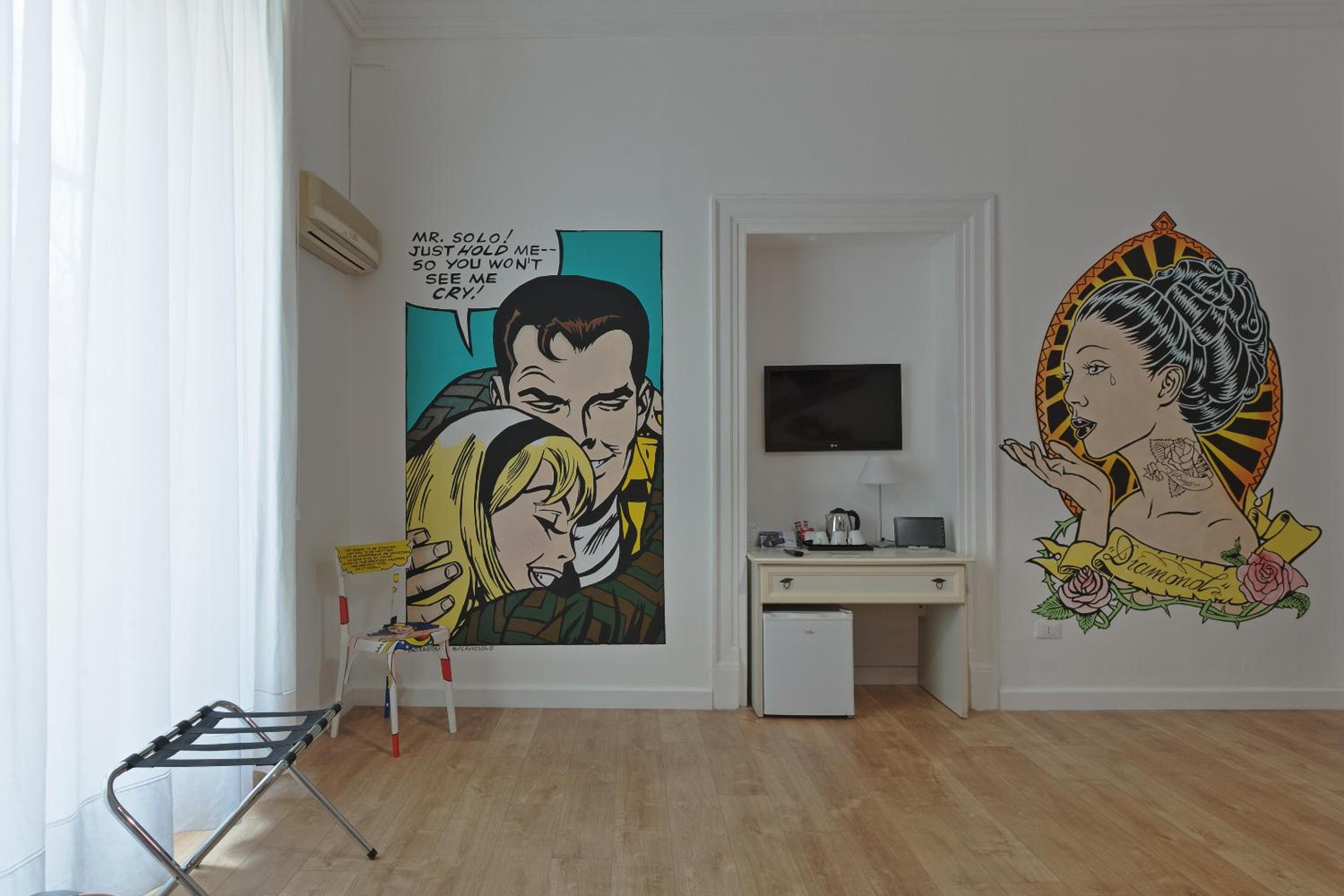 Deluxe Quadruple Room with Balcony - Photo 1