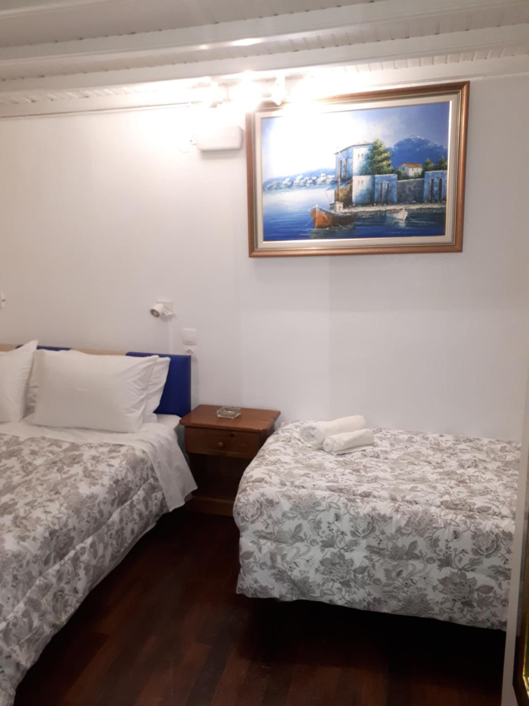 Quadruple Room with Private Bathroom