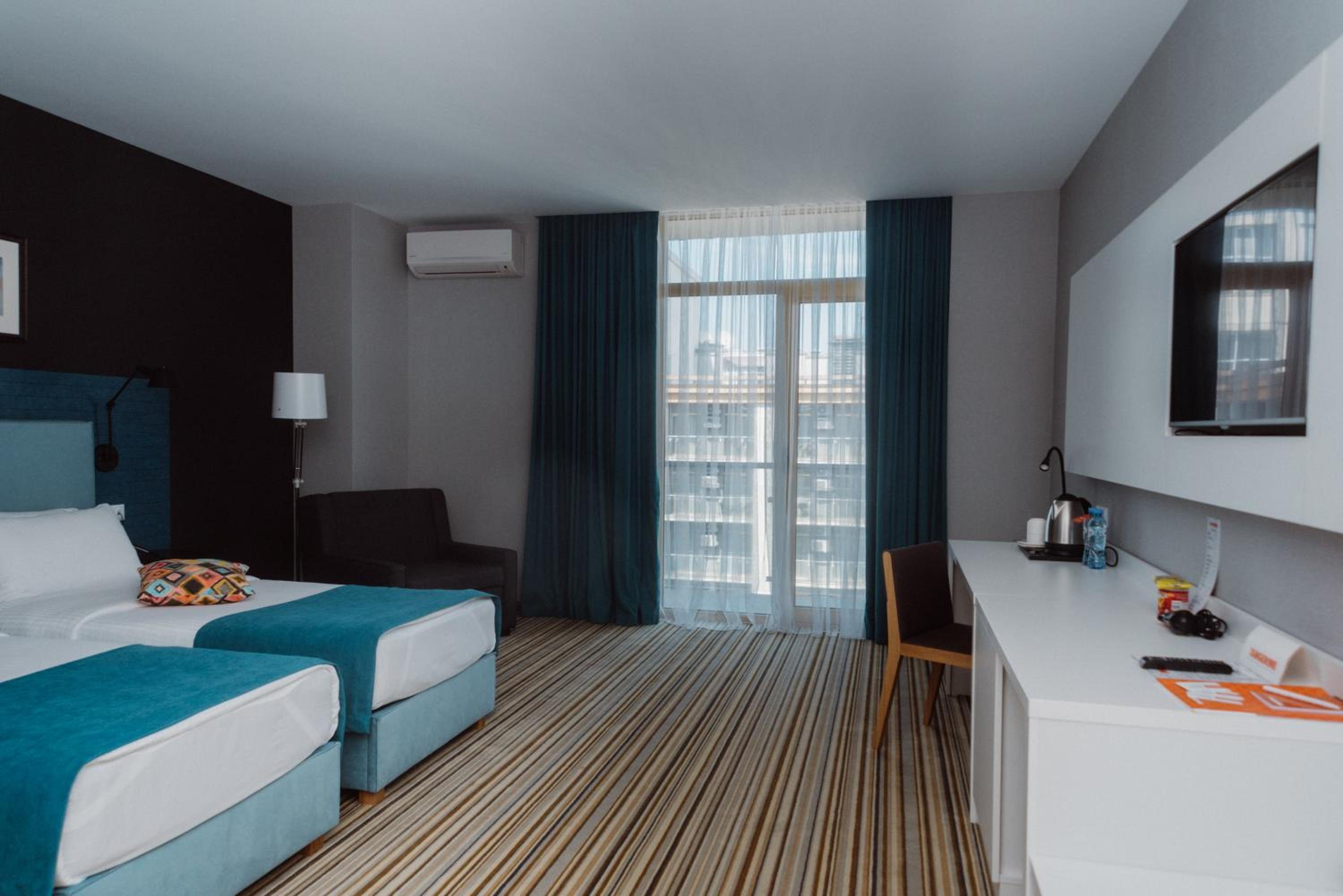 Deluxe Triple Room - Photo 9