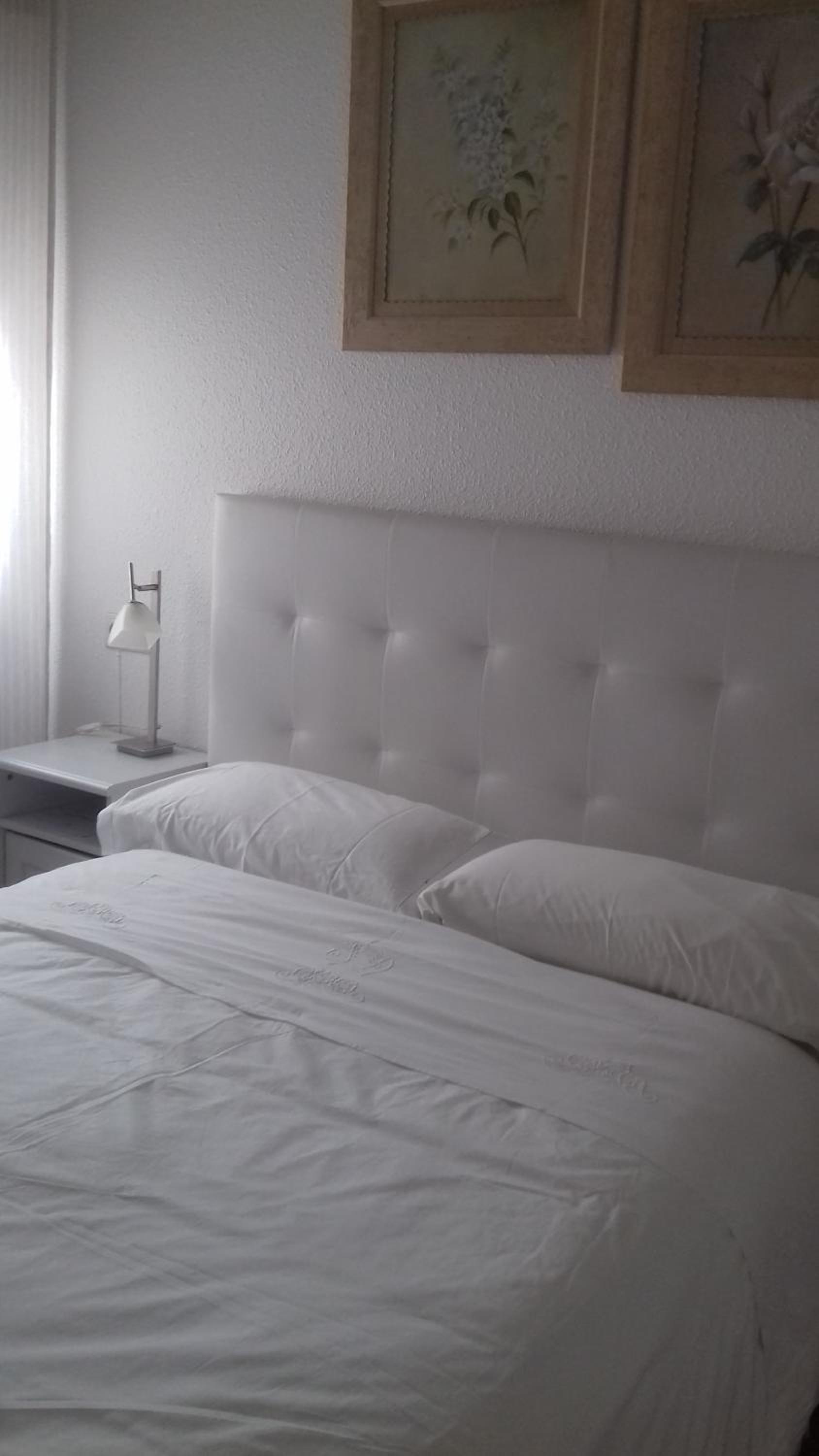 Habitación doble con baño compartido