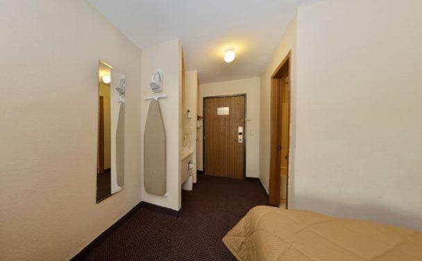 Queen Room with Two Queen Beds - Photo 9