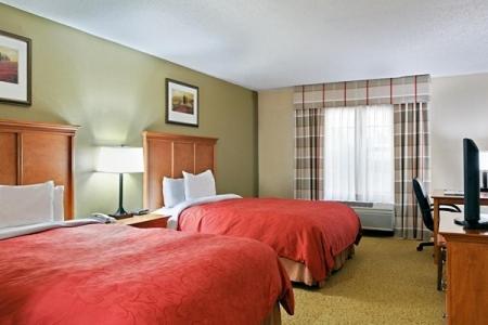 Queen Room with Two Queen Beds - Photo 1