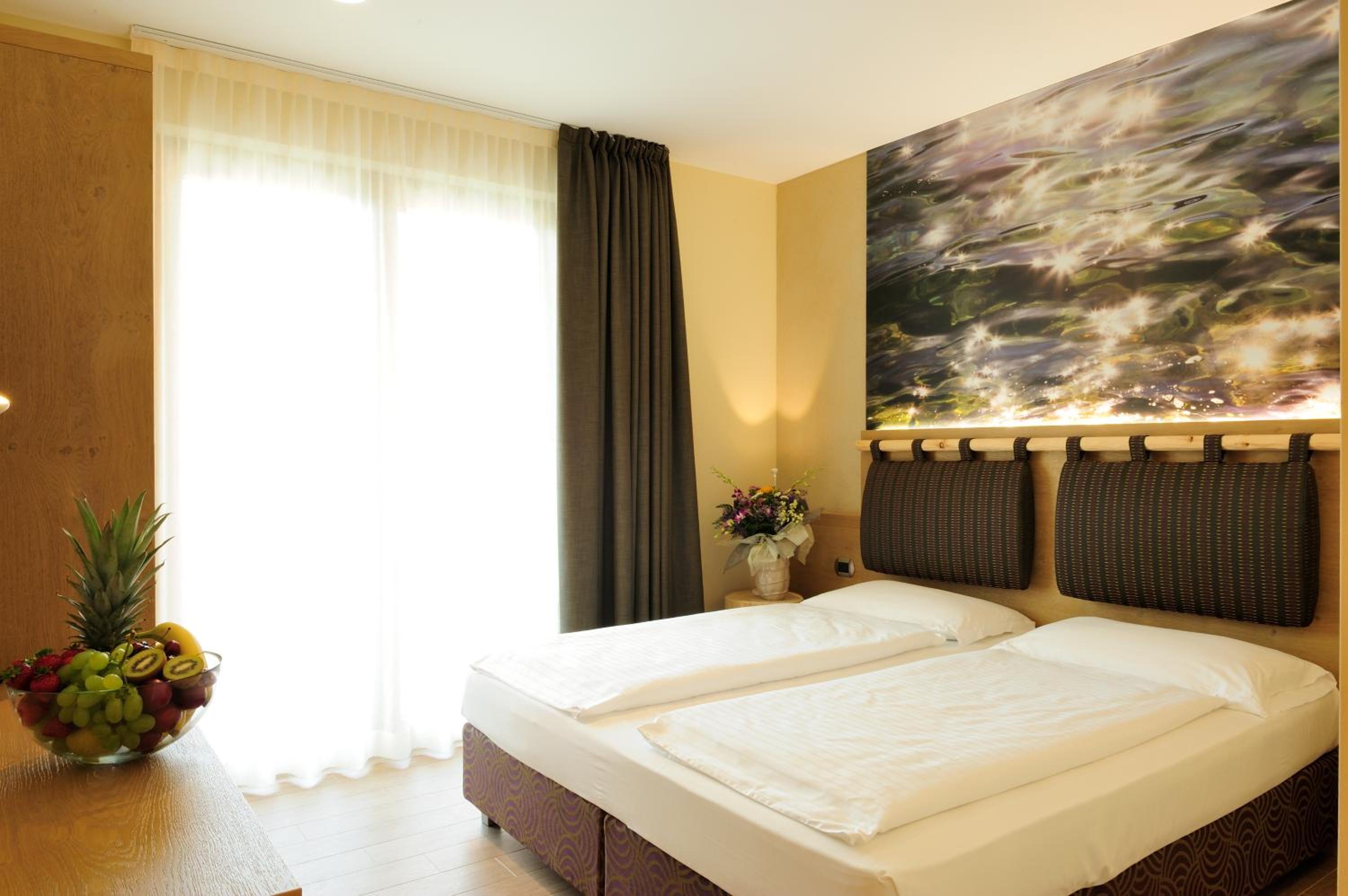 Quadruple Room with Balcony or Patio