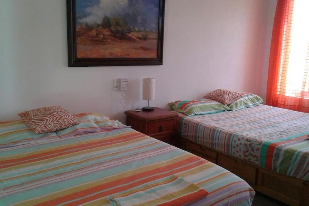 Standard Queen Room with Two Queen Beds - Photo 2