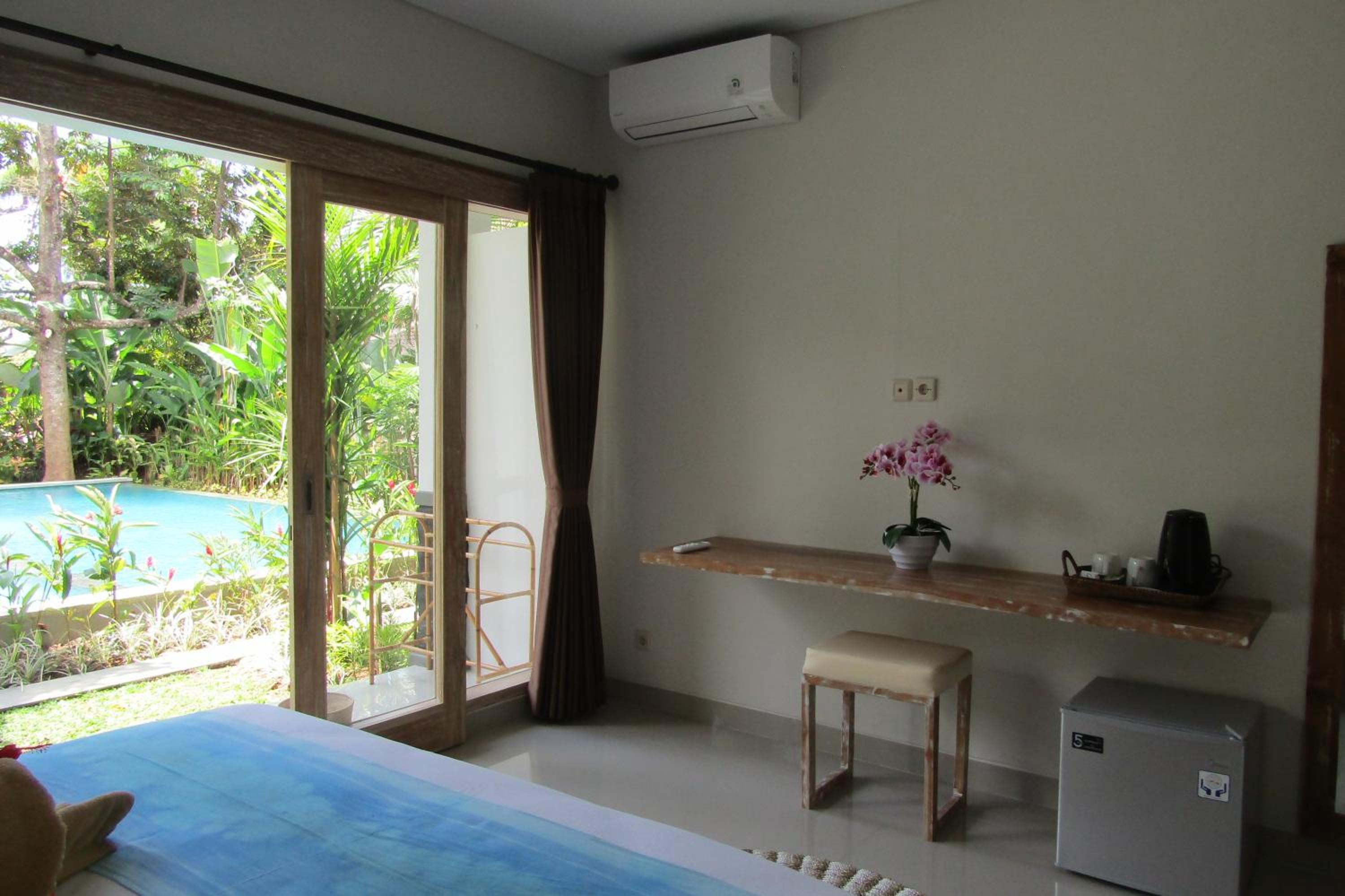 Deluxe Queen Suite - Photo 1
