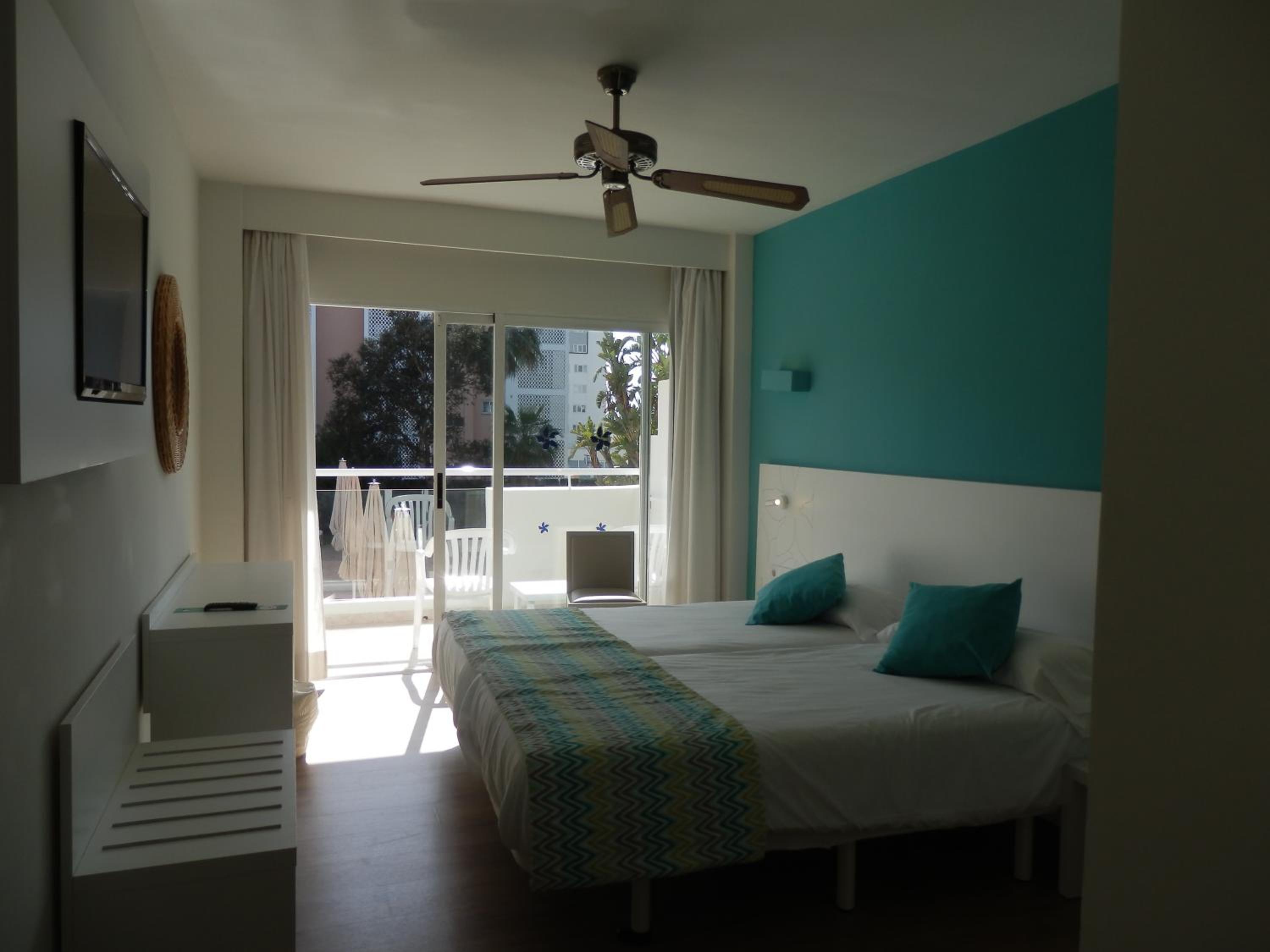 Triple Room (2 Adults + 1 Child) photo 2
