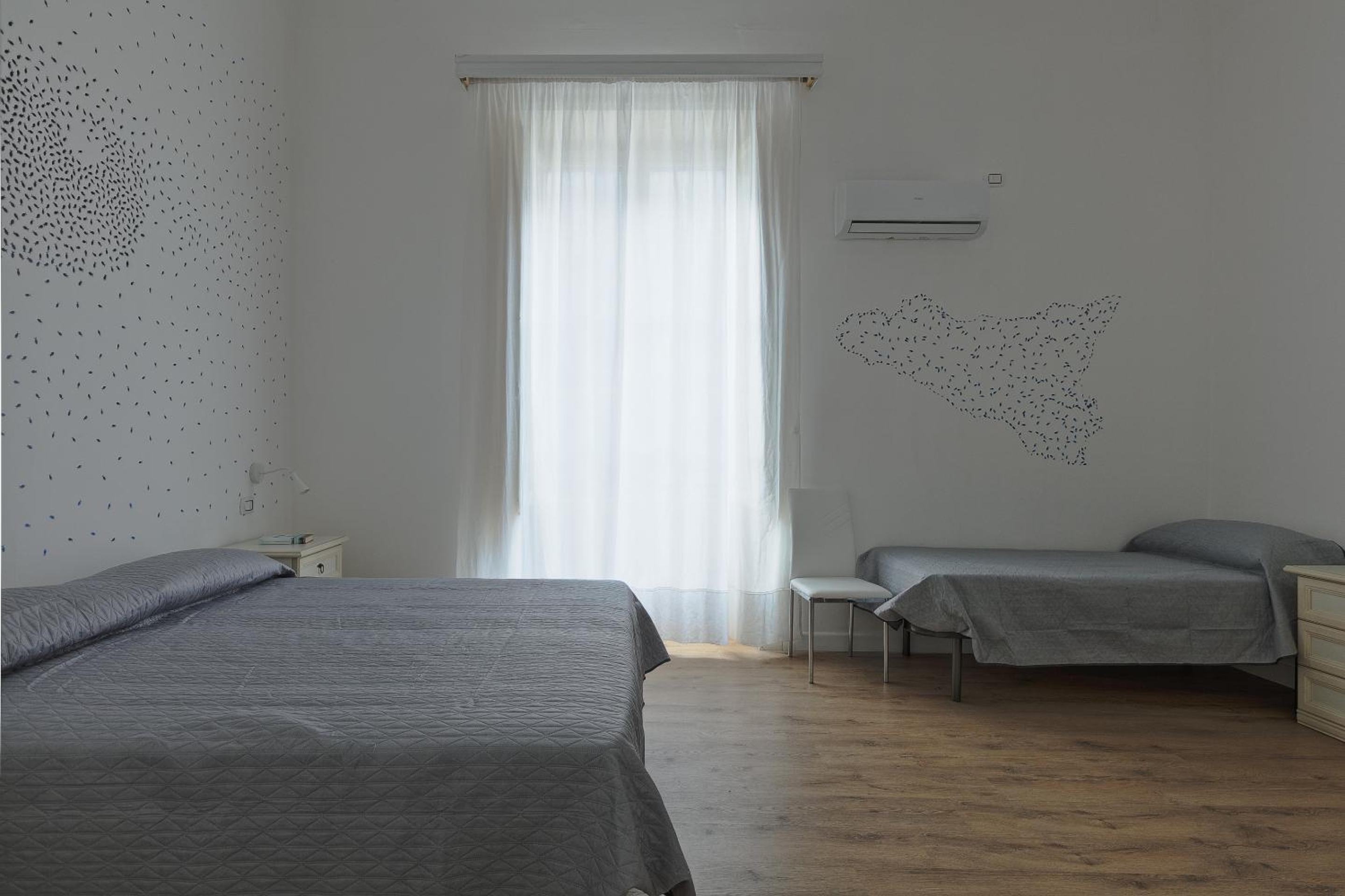 Triple Room with Balcony - Photo 1