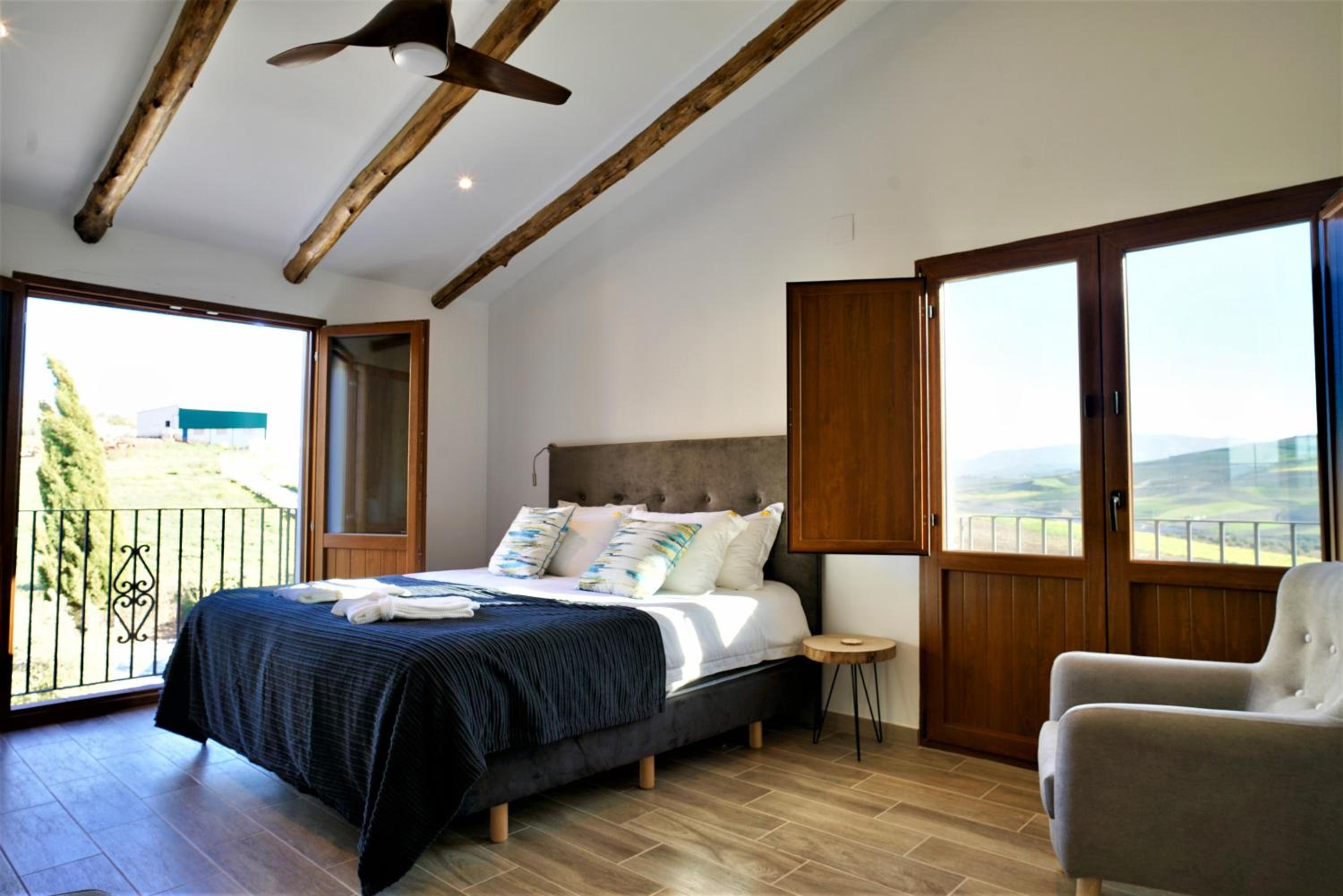 King Suite with Balcony - Photo 1