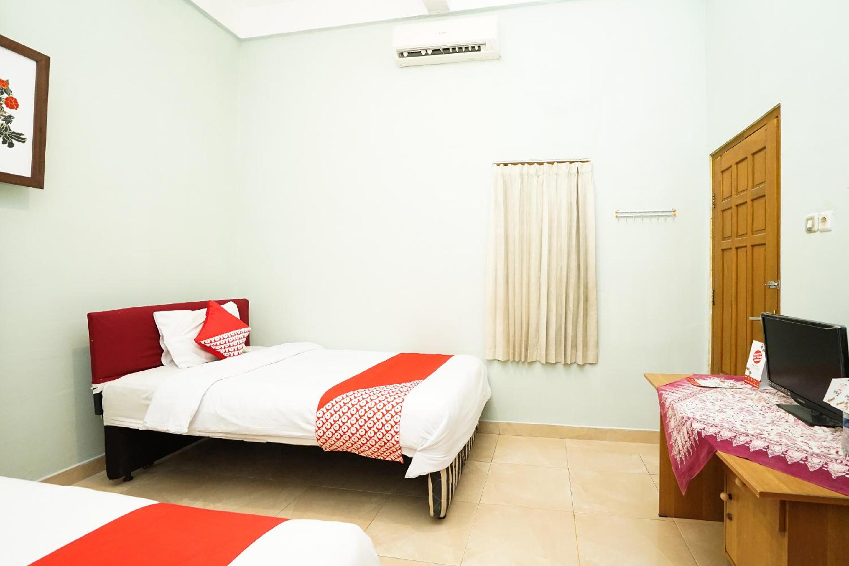 Standard Twin Room - Photo 7