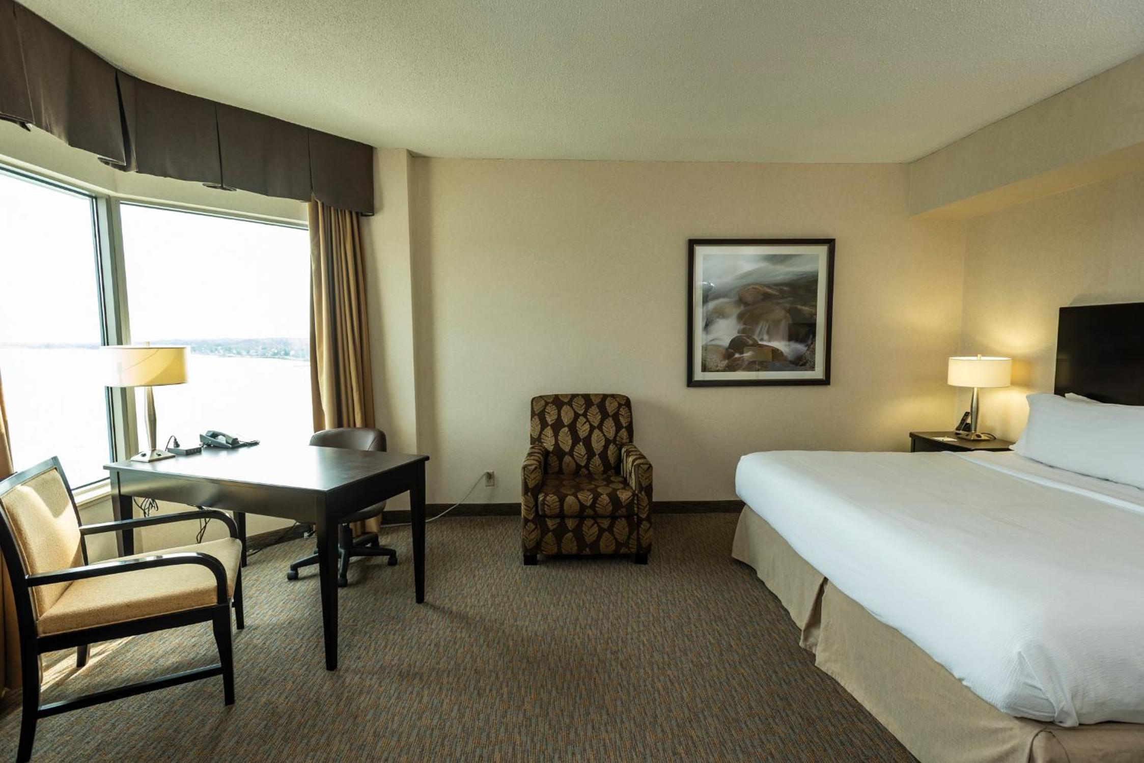 Premium King Room with Sofa Bed - Photo 1