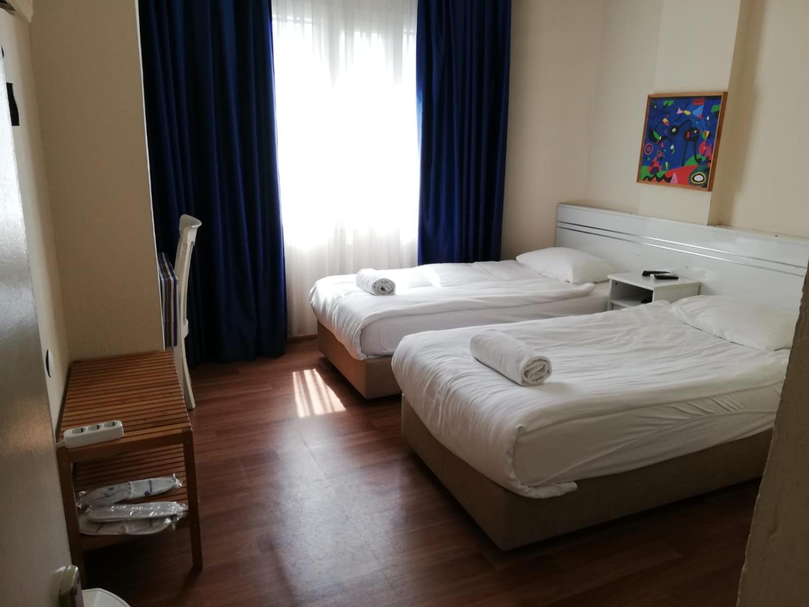 Twin Room - Photo 13