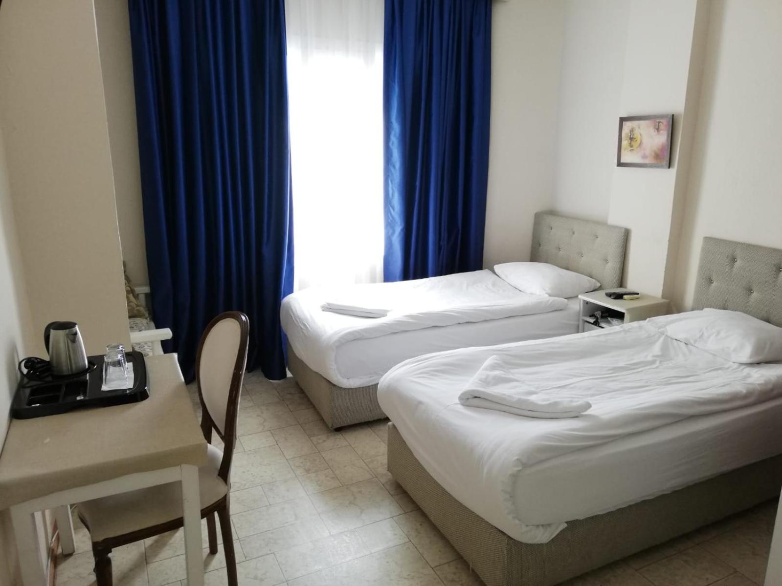 Twin Room - Photo 8