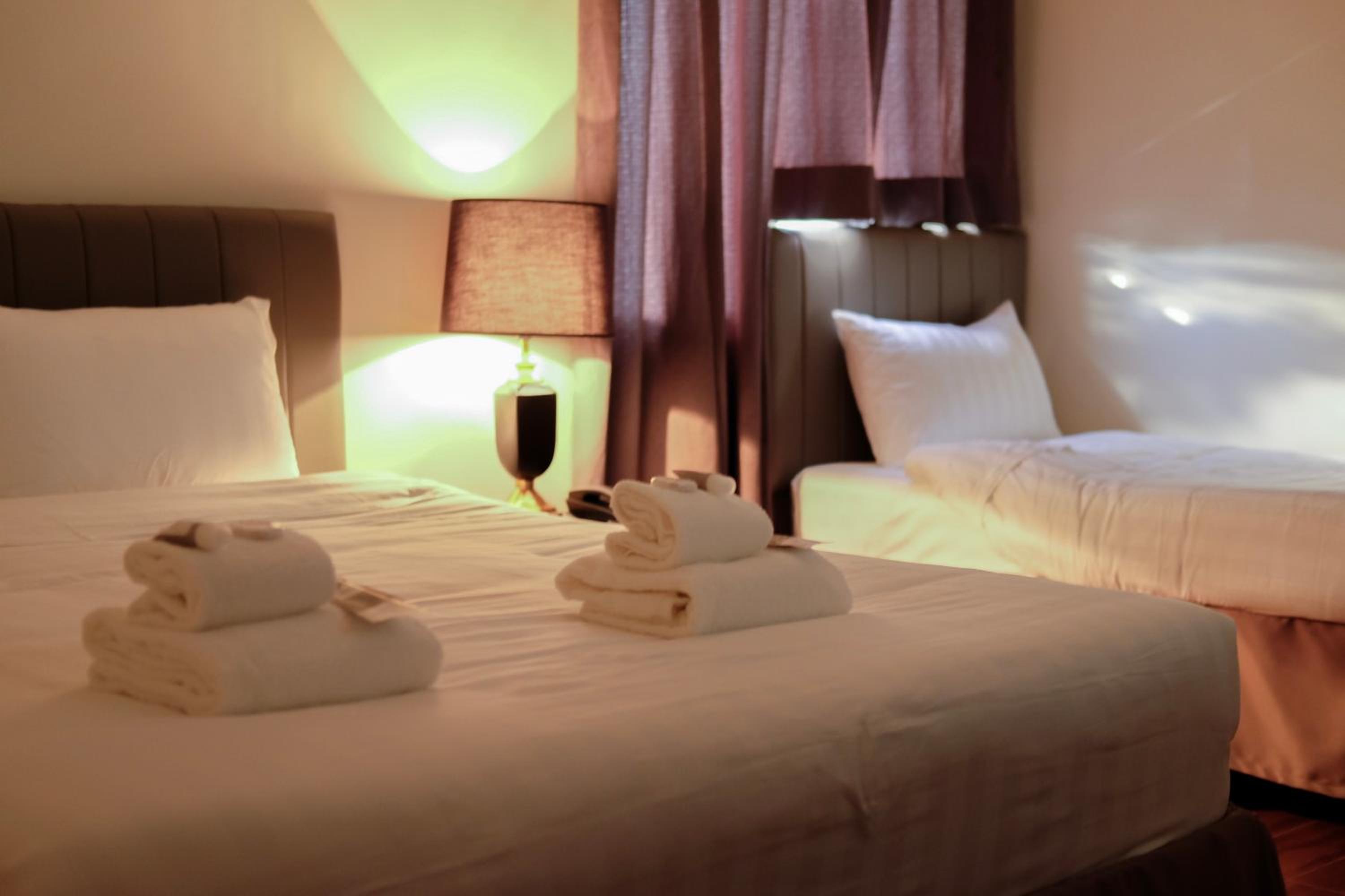 Deluxe Triple Room - Photo 10
