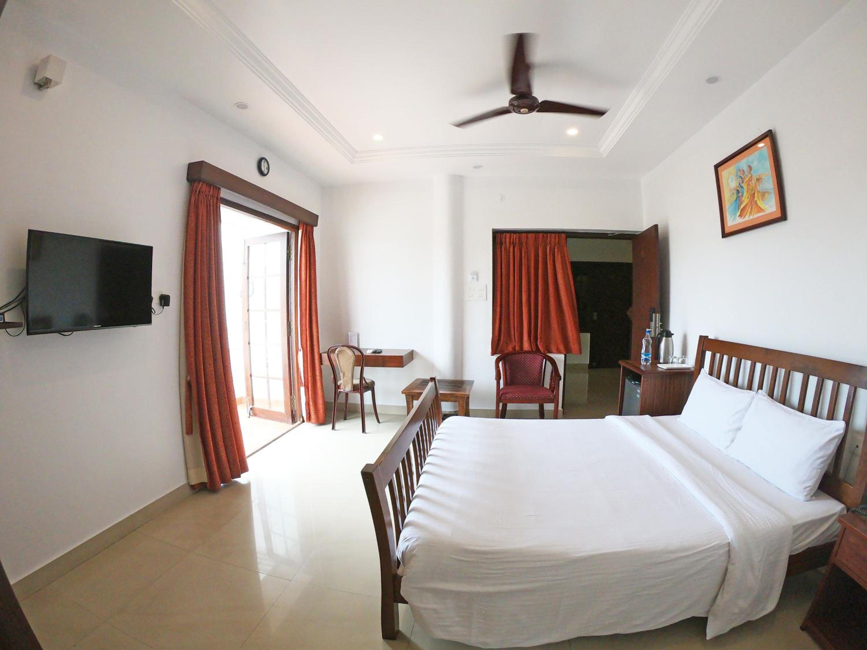 Deluxe Room - Photo 2