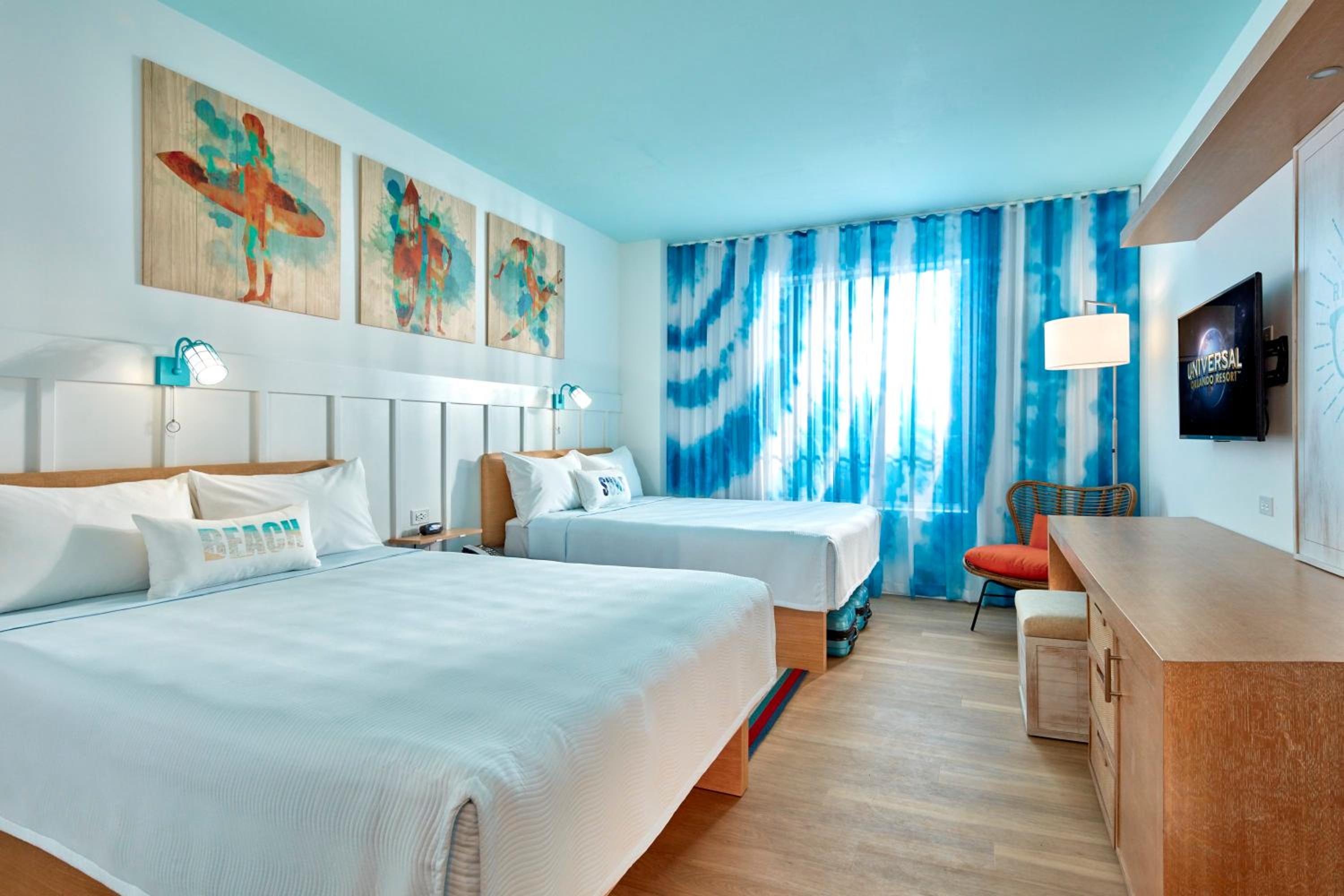 Queen Room with Two Queen Beds - Pool View (Includes Early Park Admission*)