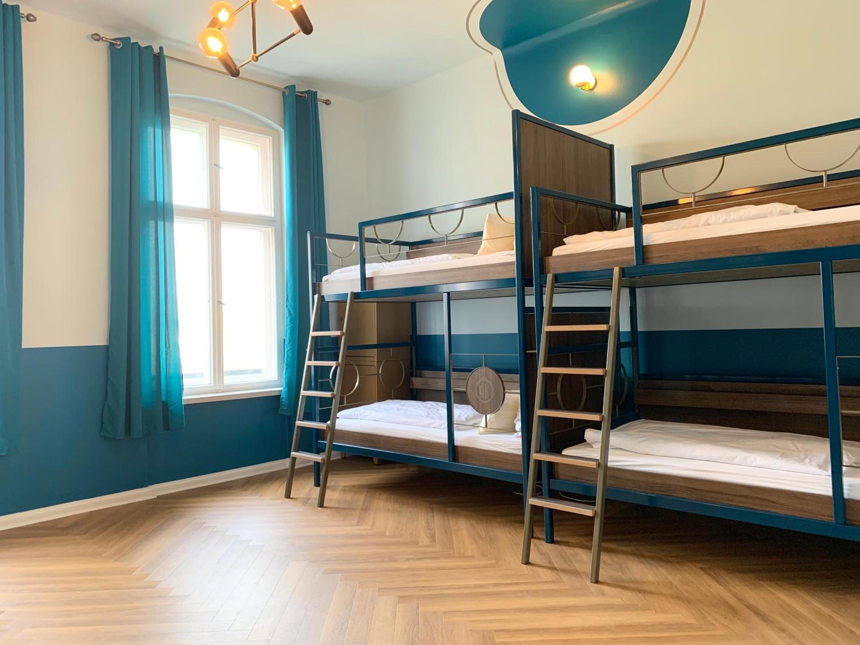 Bed in 8-Bed Mixed Dormitory Room with Private Bathroom photo 1