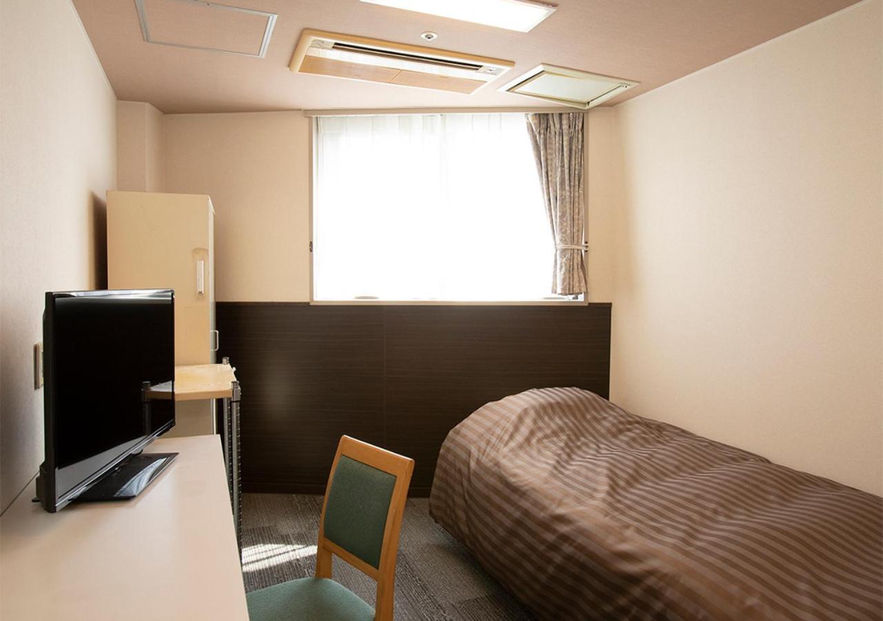 Single Room With Shared Shower And Toilet photo 1