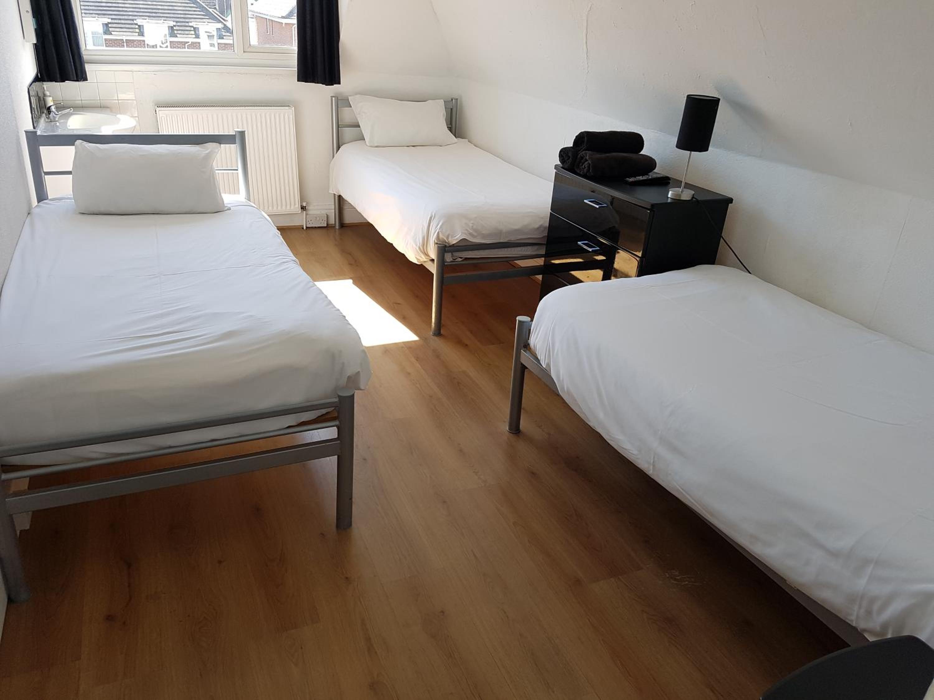 Triple Room with Garden View and Shared Bathroom