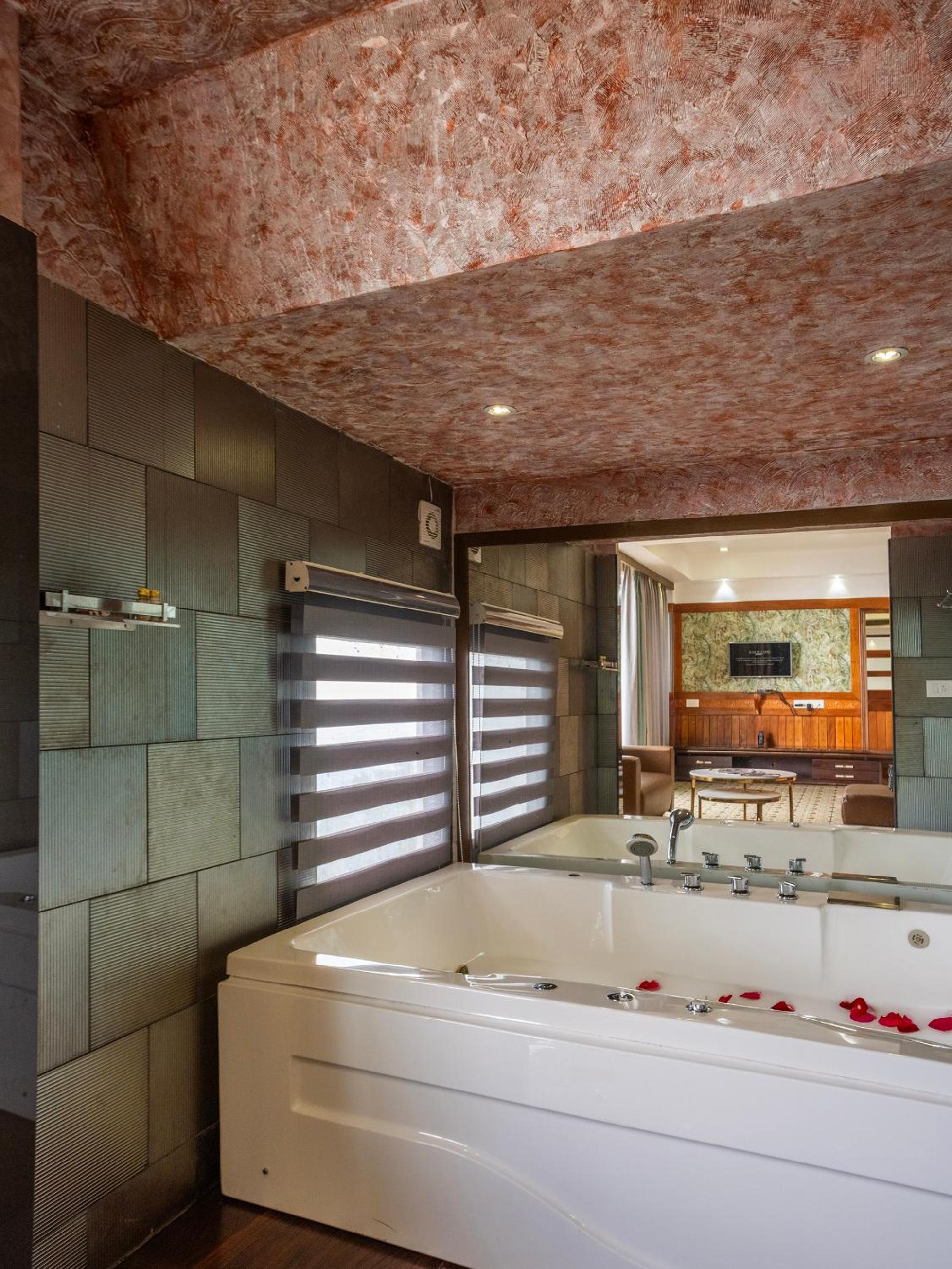Jacuzzi Club Suite with Complimentary Adventure Activities and 100 Spread Breakfast