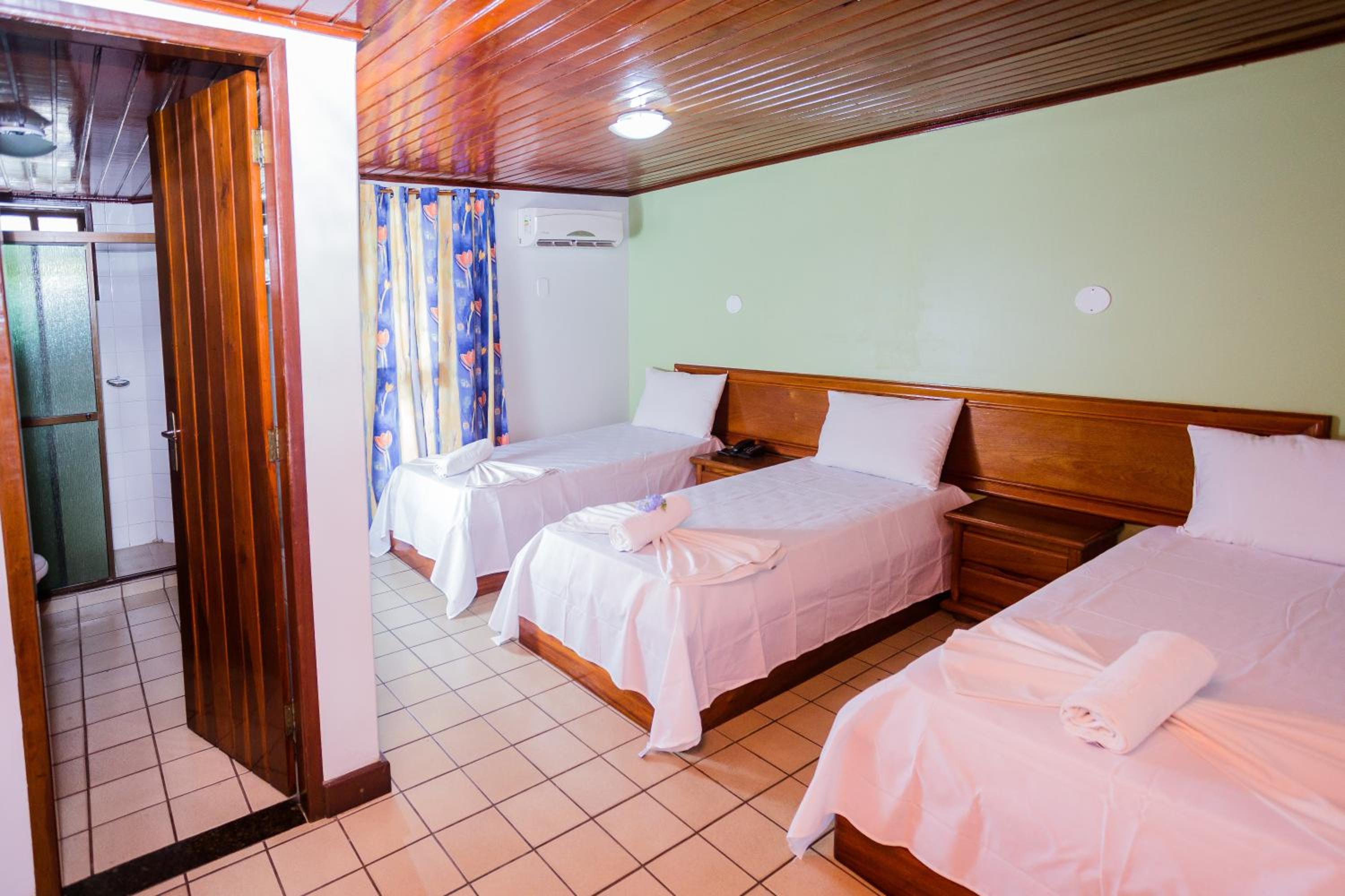 Rede Andrade Estrela Dalva Centro Hotel — Standard Quadruple Room
