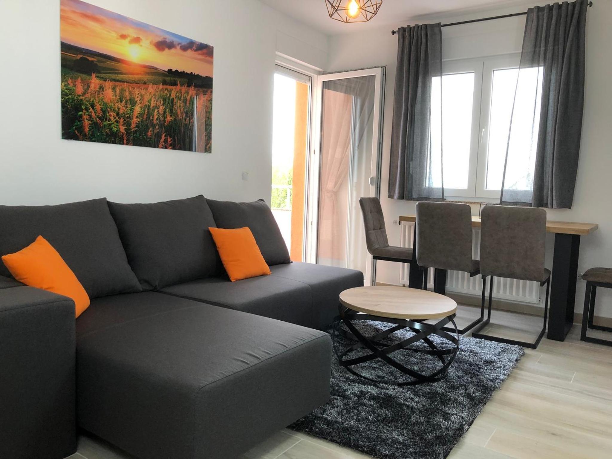 One-Bedroom Apartment with Balcony and Partial Sea View