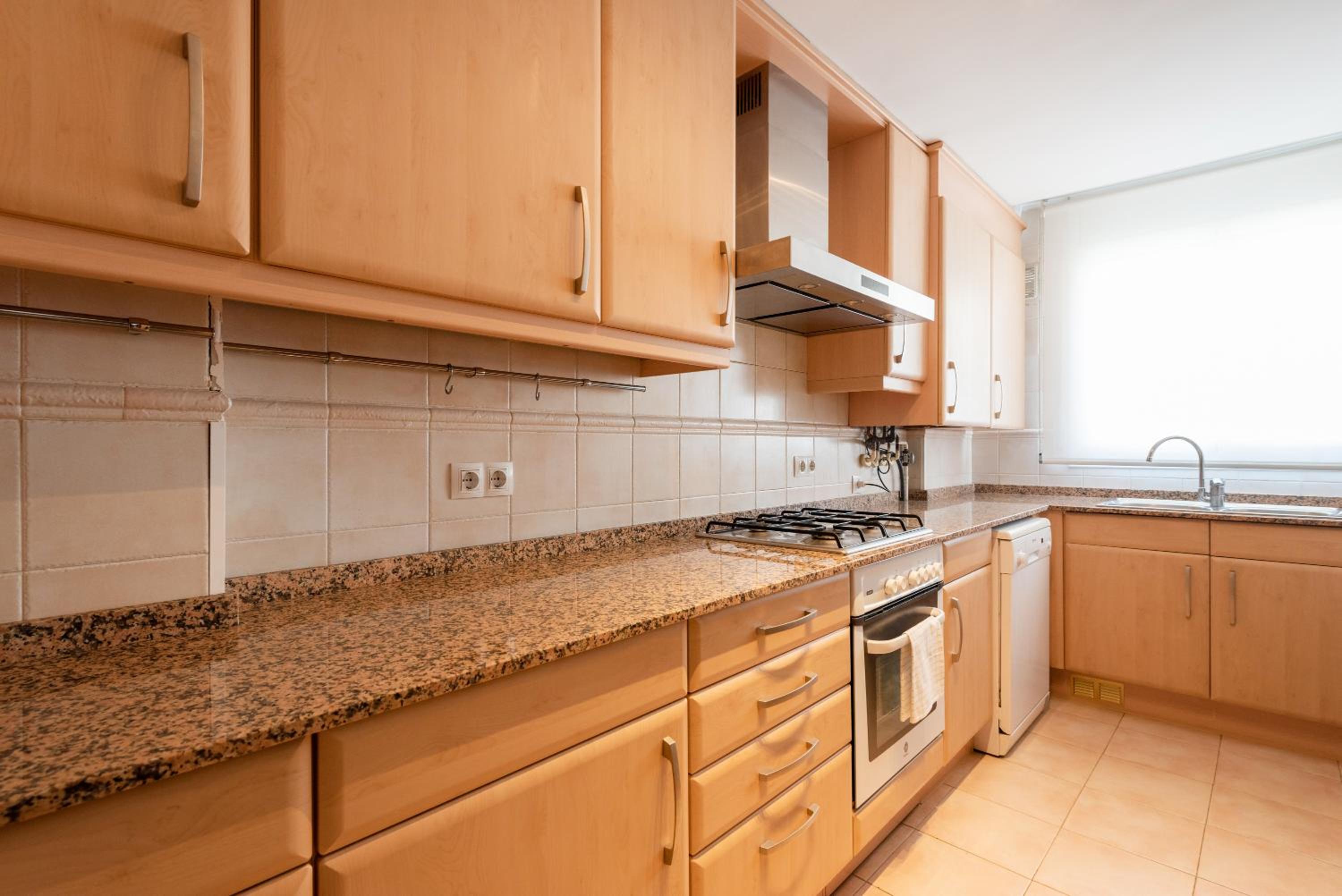 Three-Bedroom Apartment - Photo 12