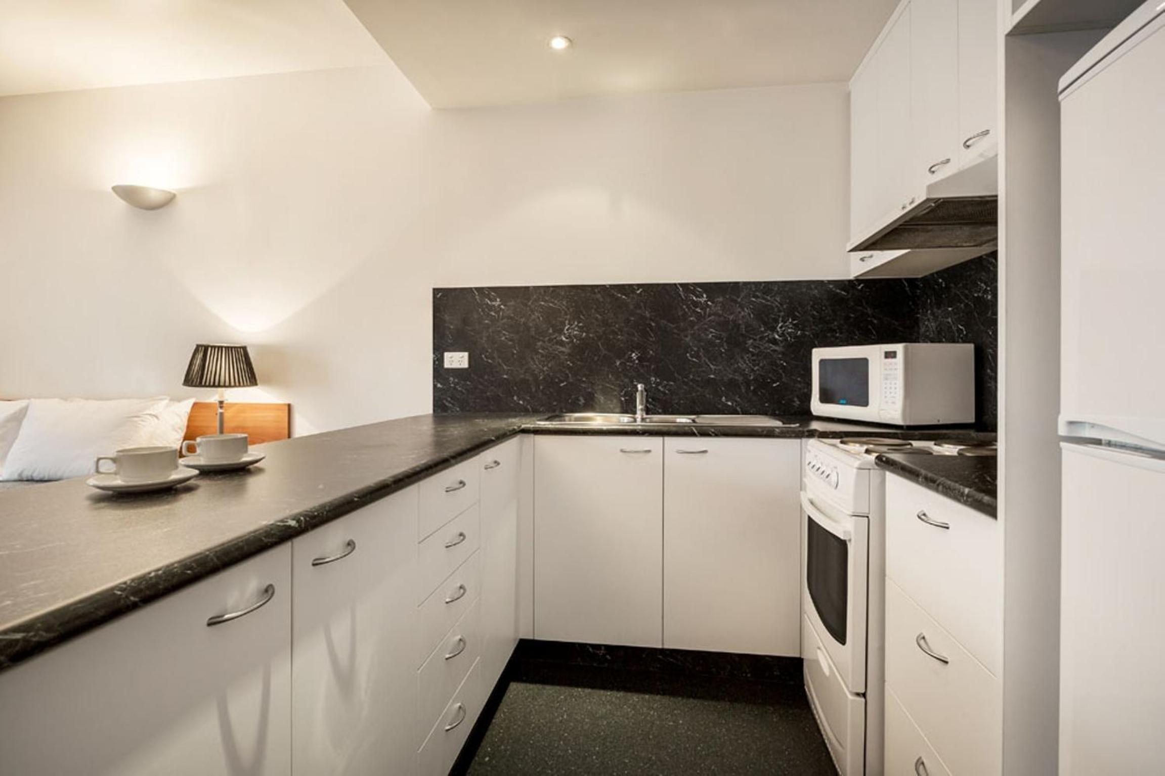  Budget One-Bedroom Apartment - Separate Building, stair access only - Photo 7