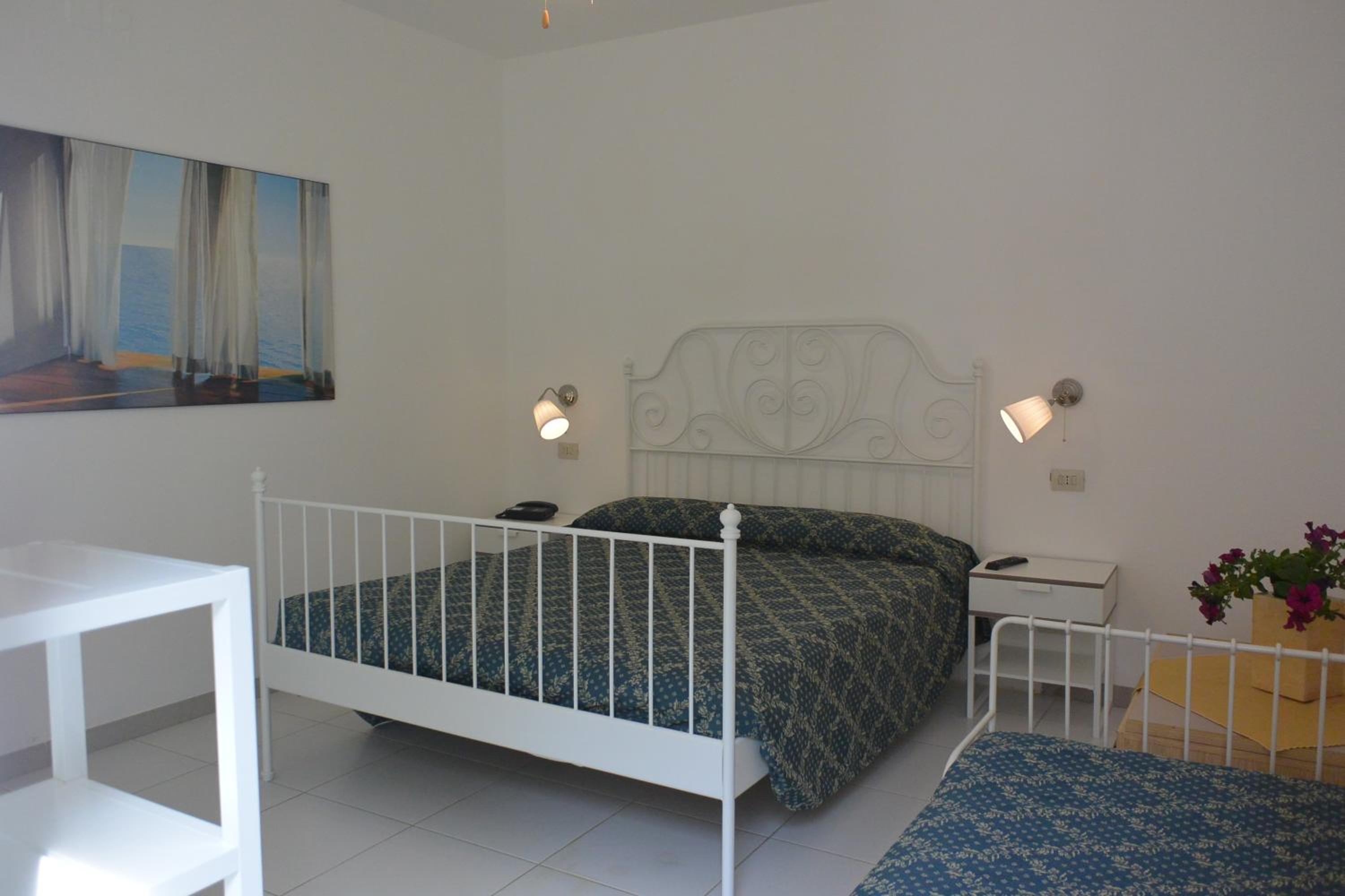  Triple Room (3 Adults + 1 Child) photo 2
