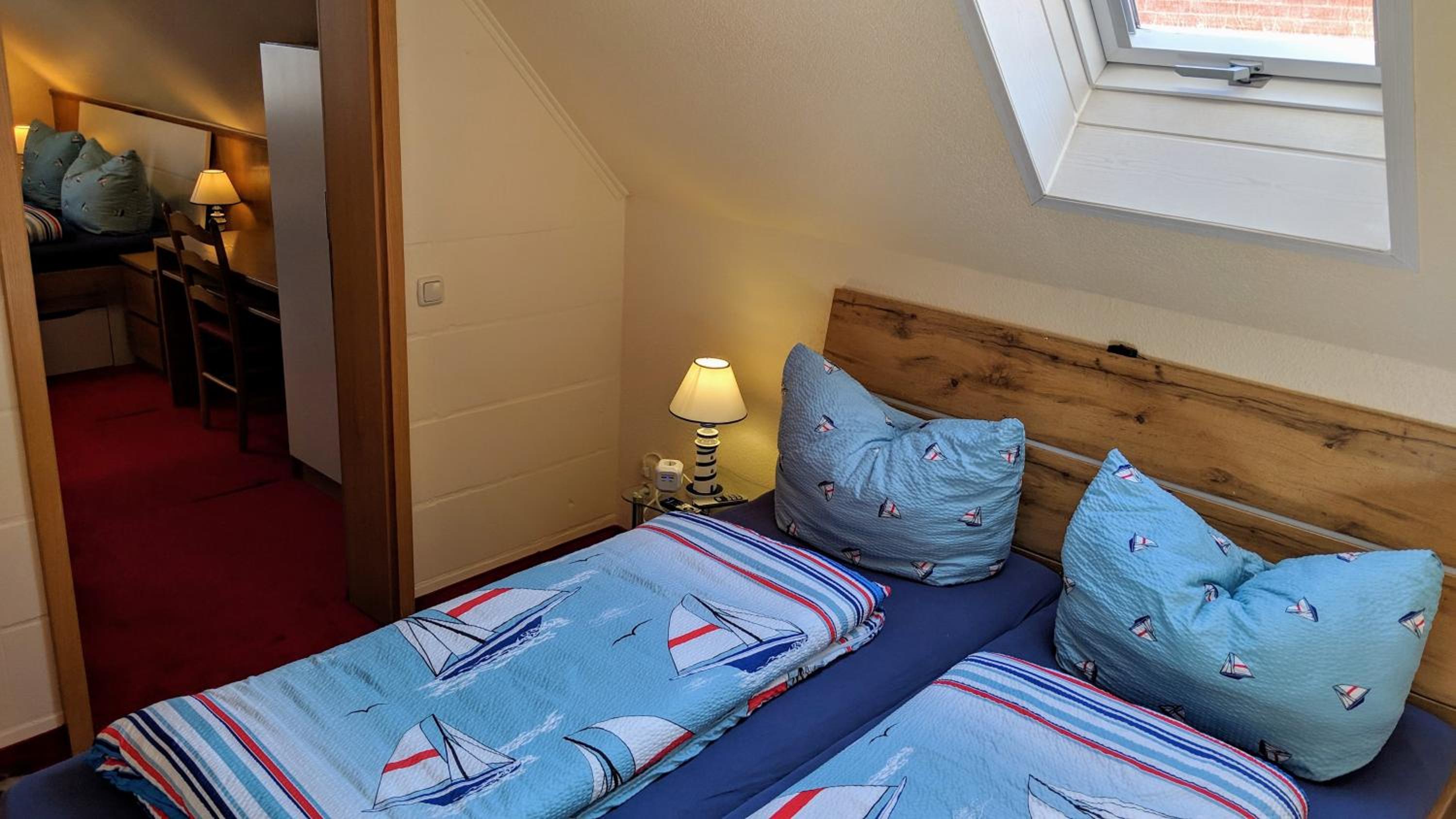 Deluxe Quadruple Room - Photo 11
