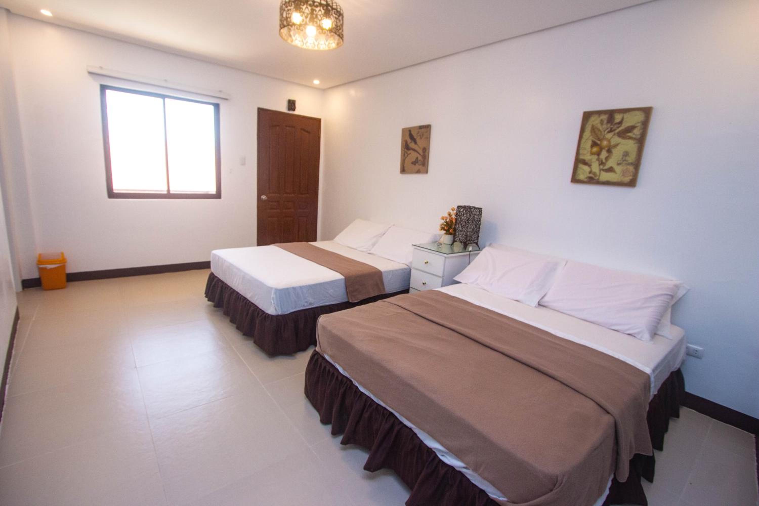 Deluxe Quadruple Room - Photo 1
