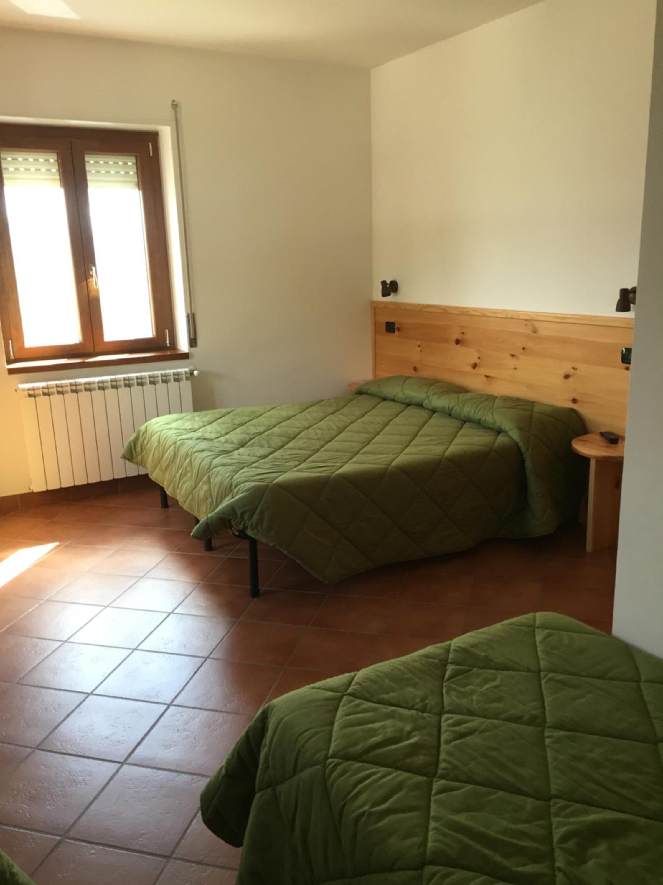 Quadruple Room with Private Bathroom - Photo 2