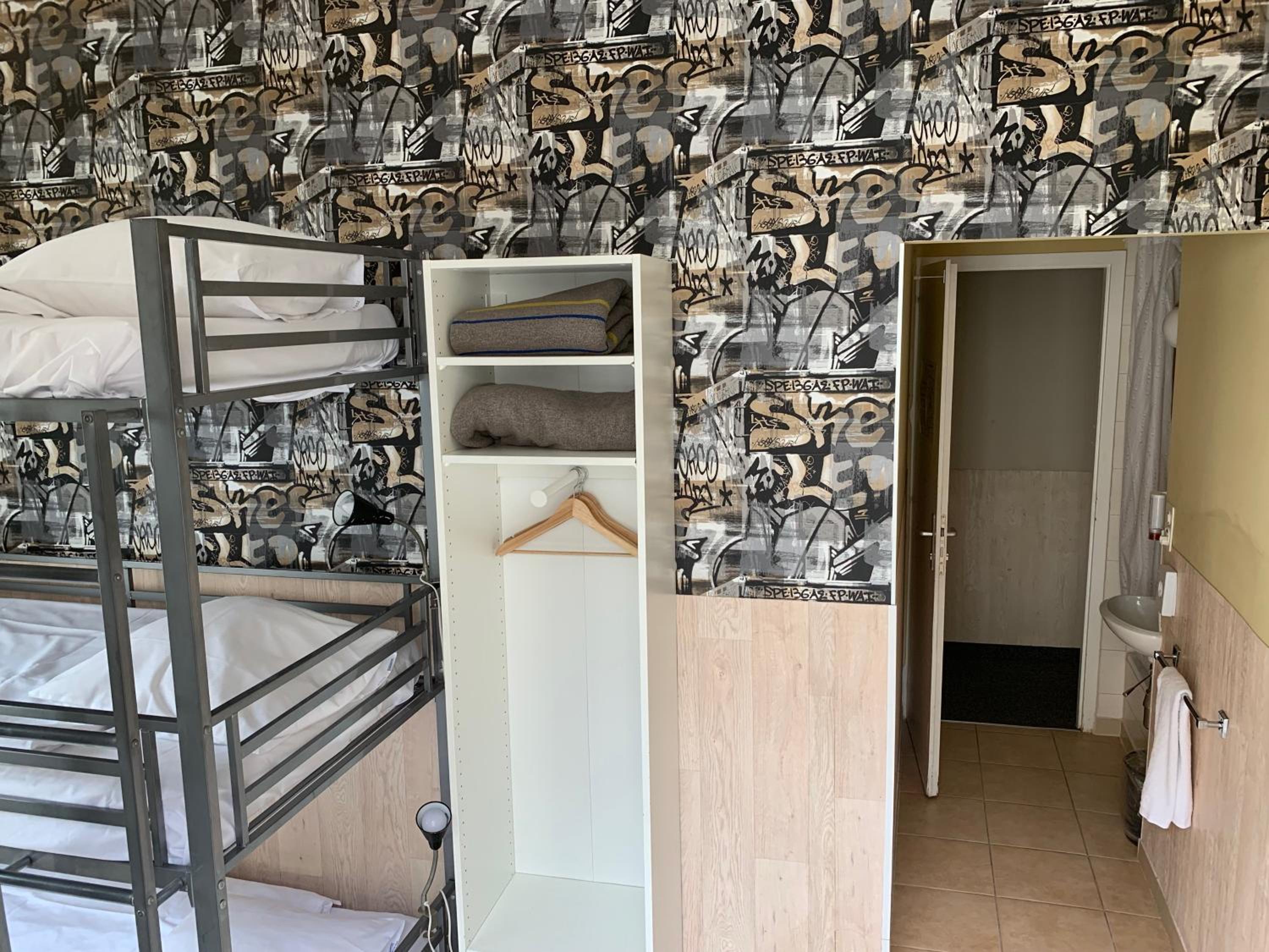 Triple Bunk Bed Room with Shared Toilet  photo 3