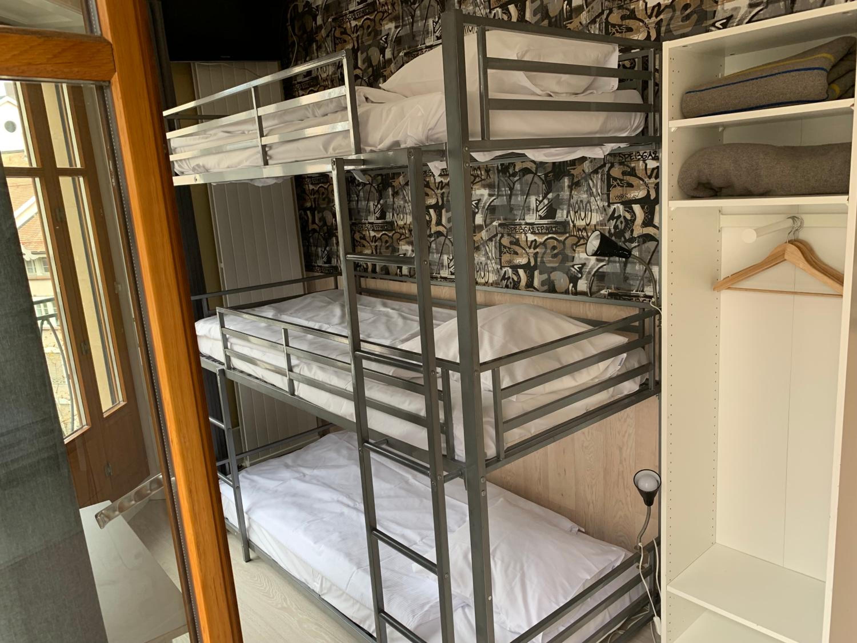 Triple Bunk Bed Room with Shared Toilet  photo 2