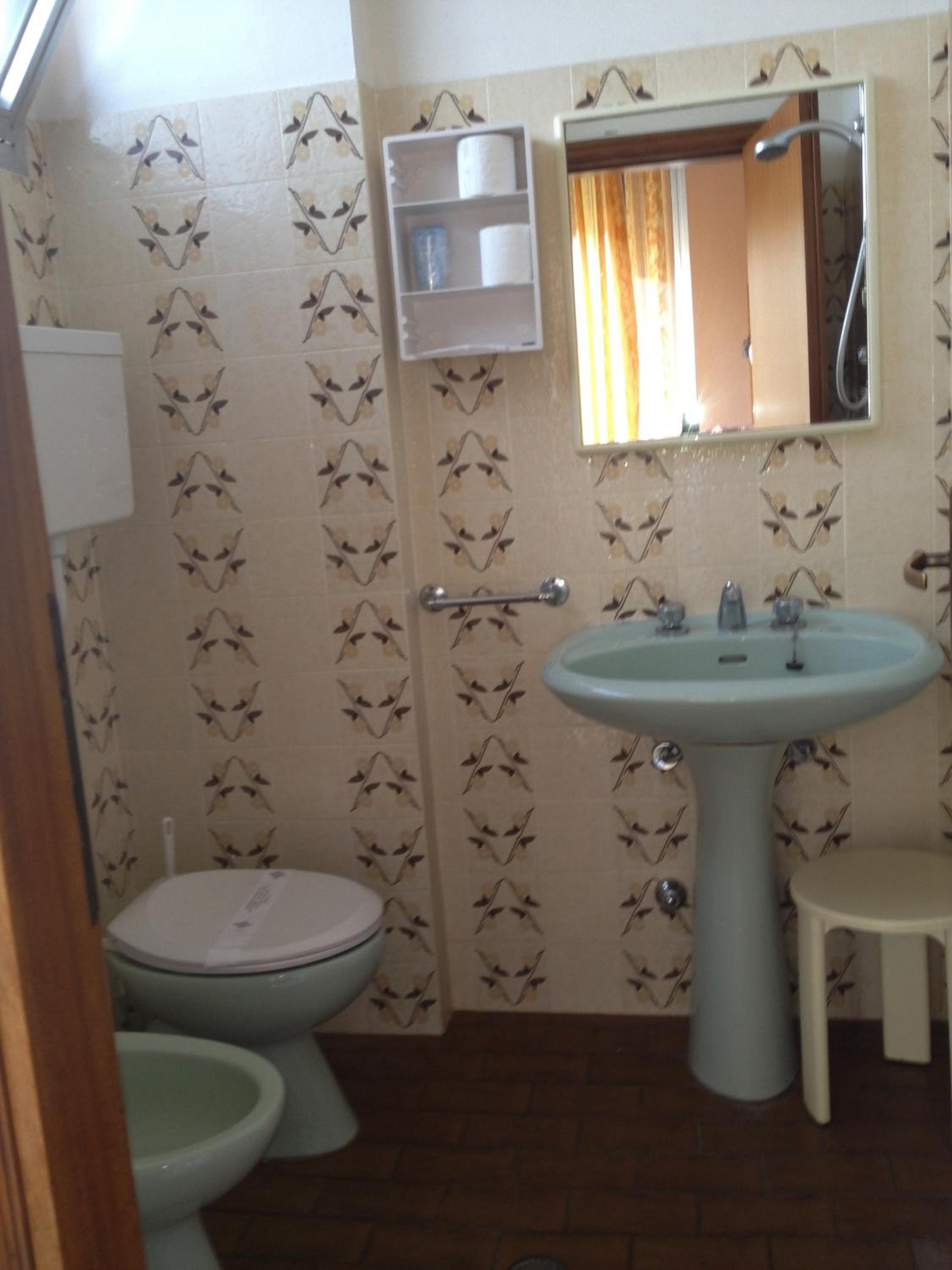 Quadruple Room with Balcony photo 3