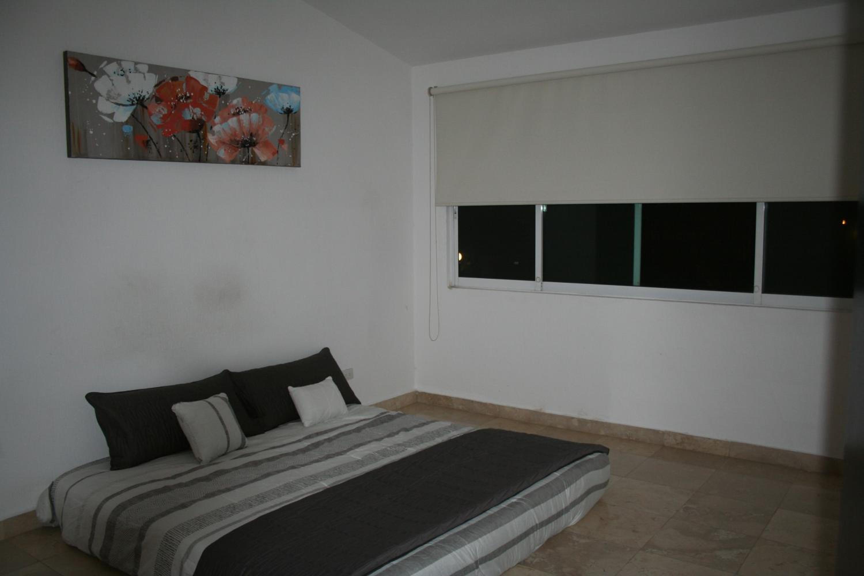 Three-Bedroom Apartment photo 1