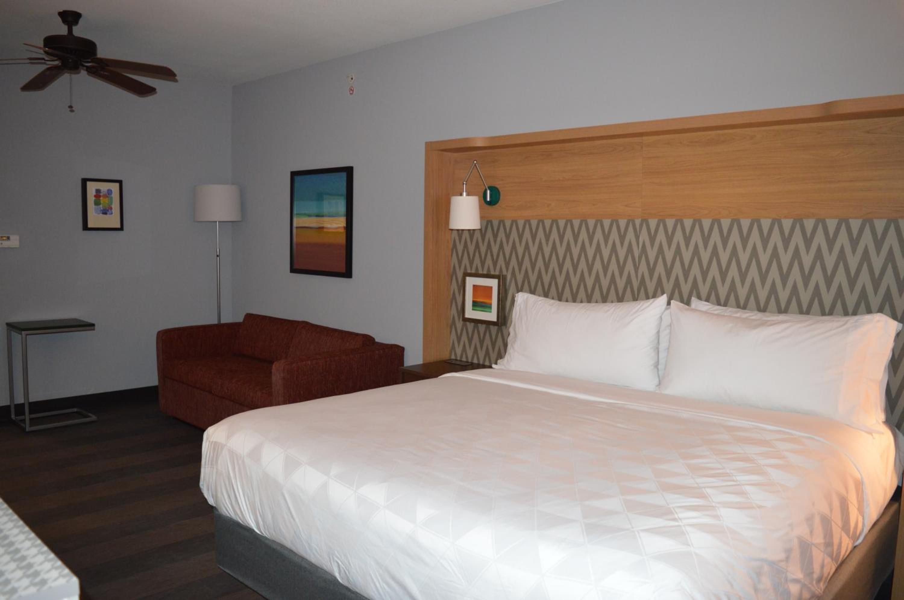 Premium Queen Room with Two Queens and One Sofa Bed - Photo 1