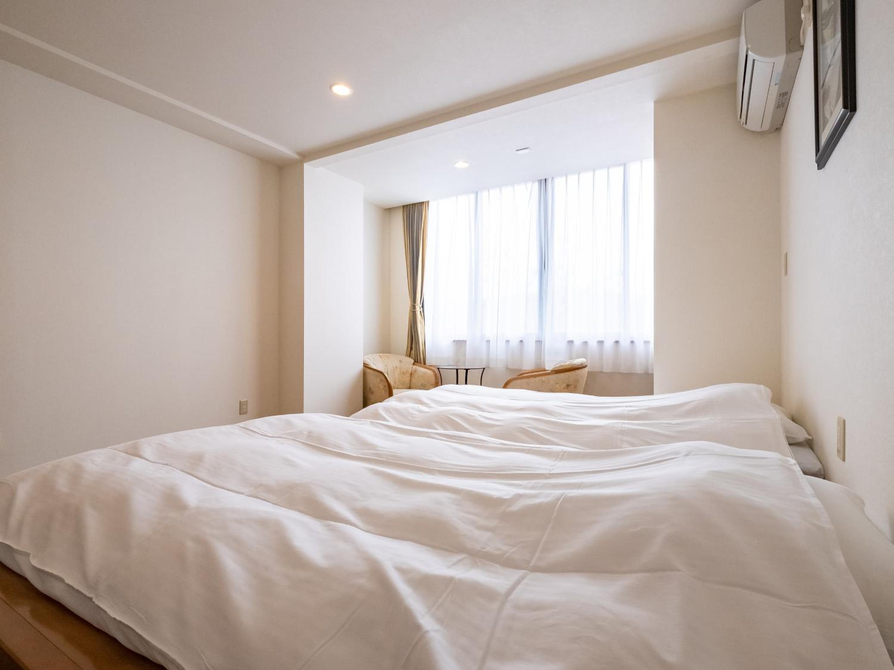 Twin Room - Photo 2