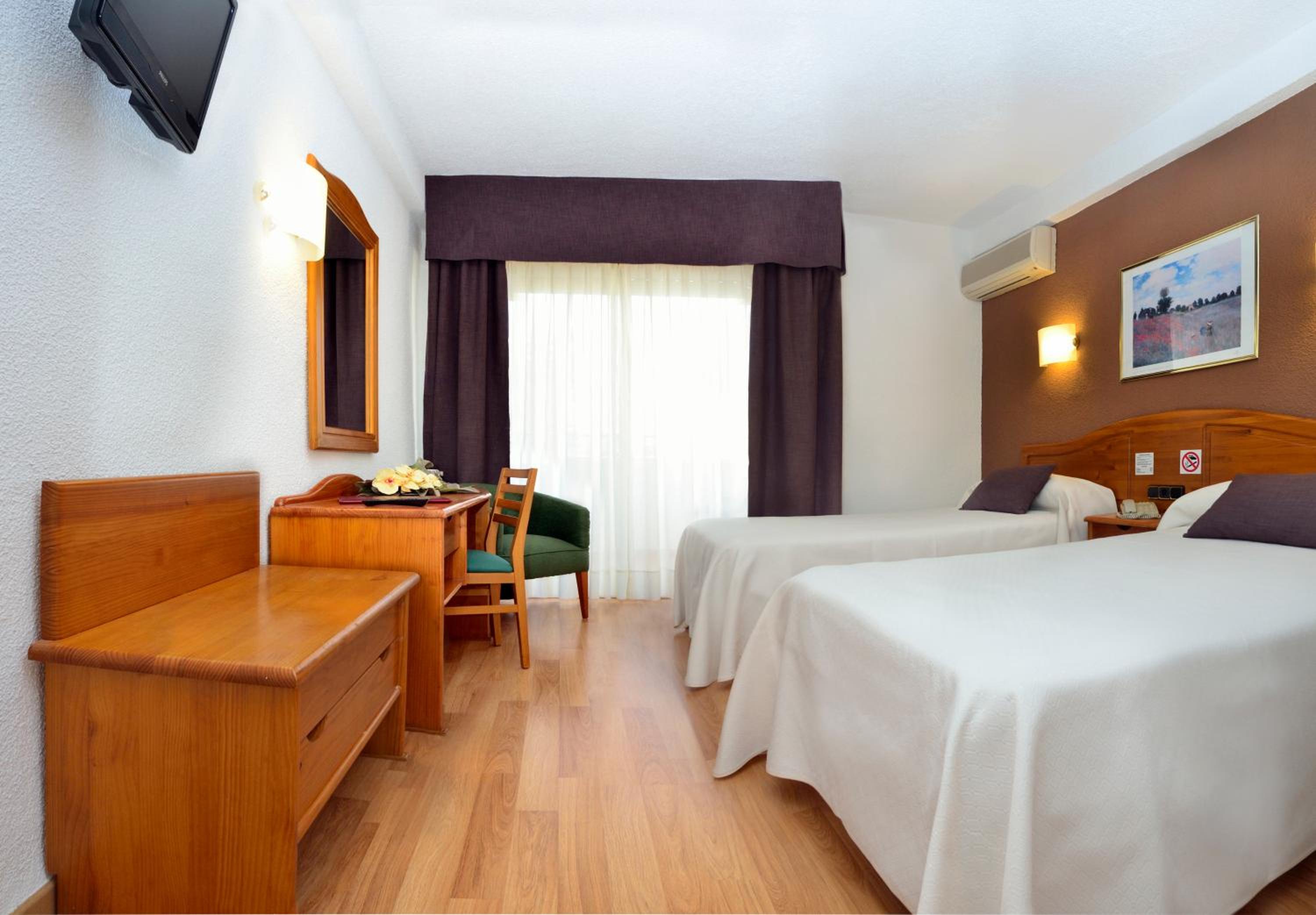 Habitación Doble (1 Adulto + 1 Niño)