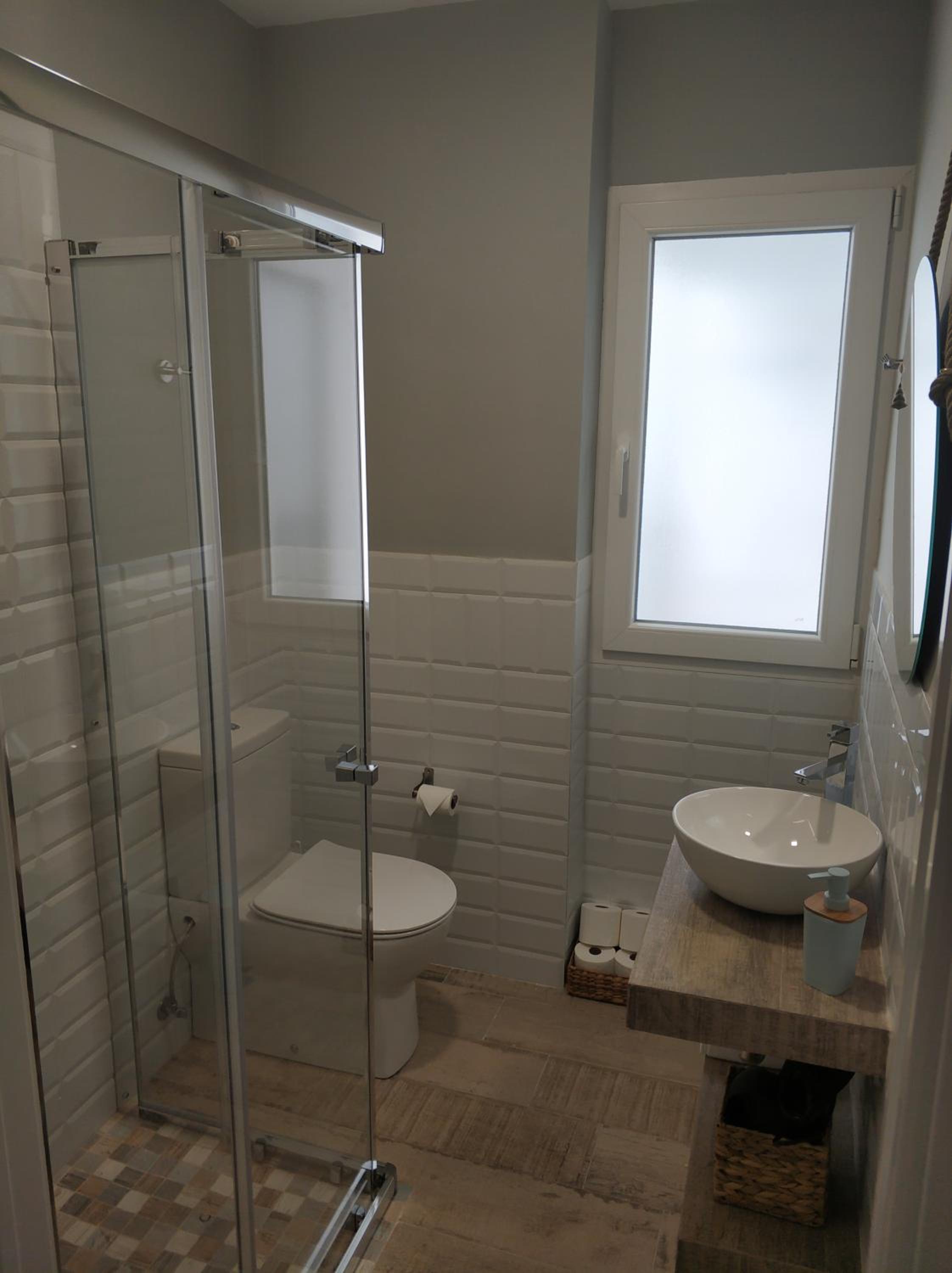 Three-Bedroom House - Photo 26