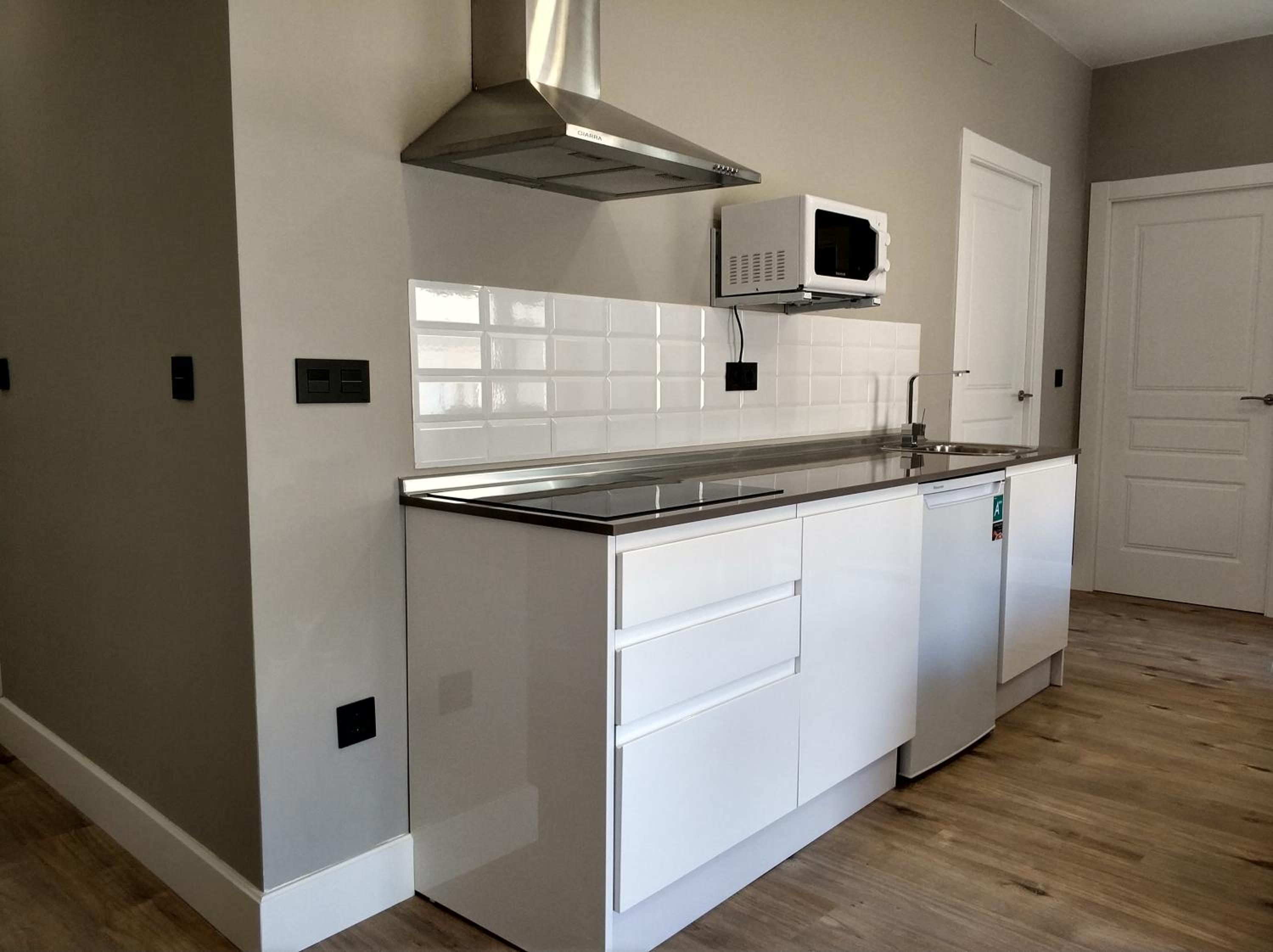 Three-Bedroom House - Photo 11