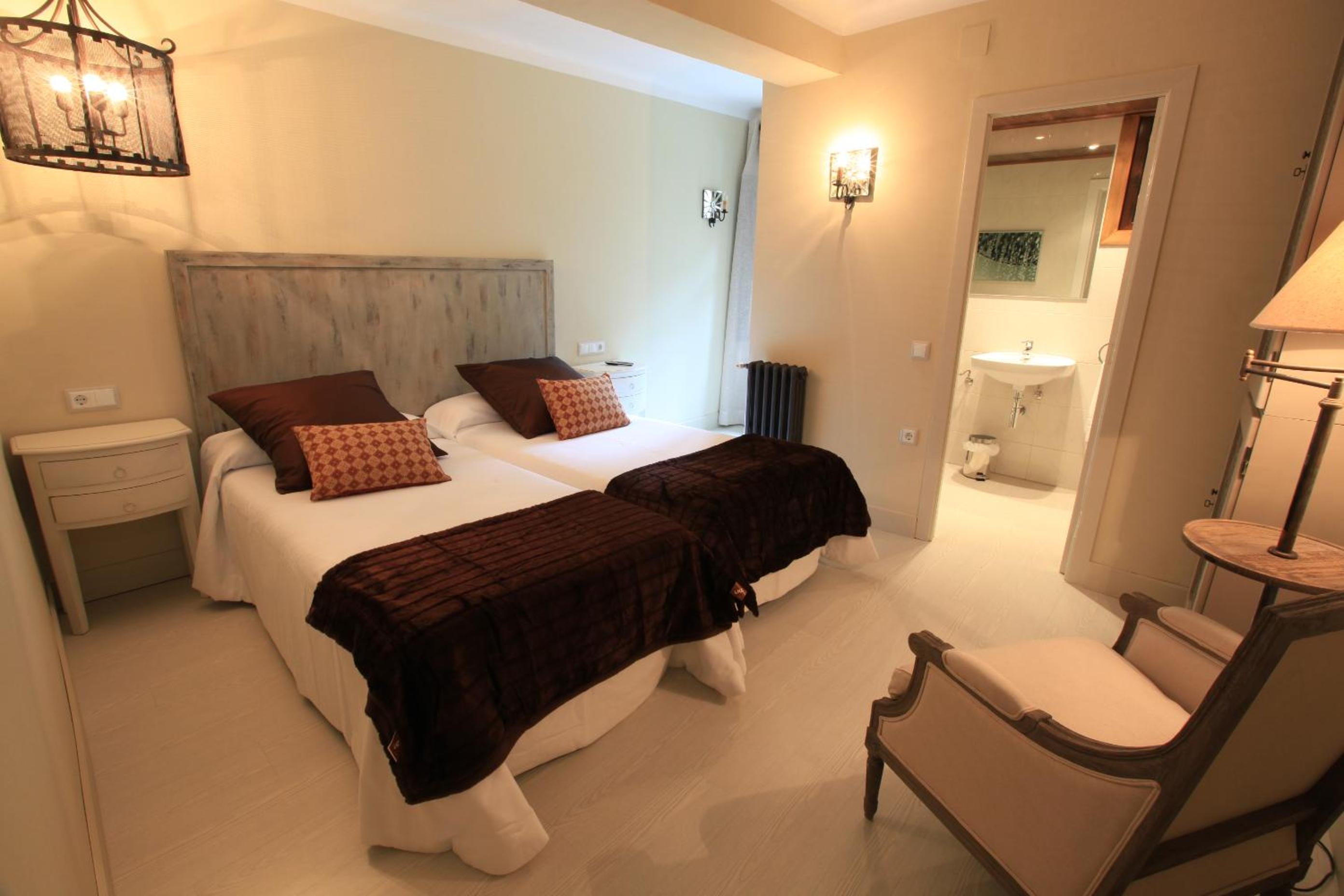 Habitación Deluxe Queen con Dos Camas Queen