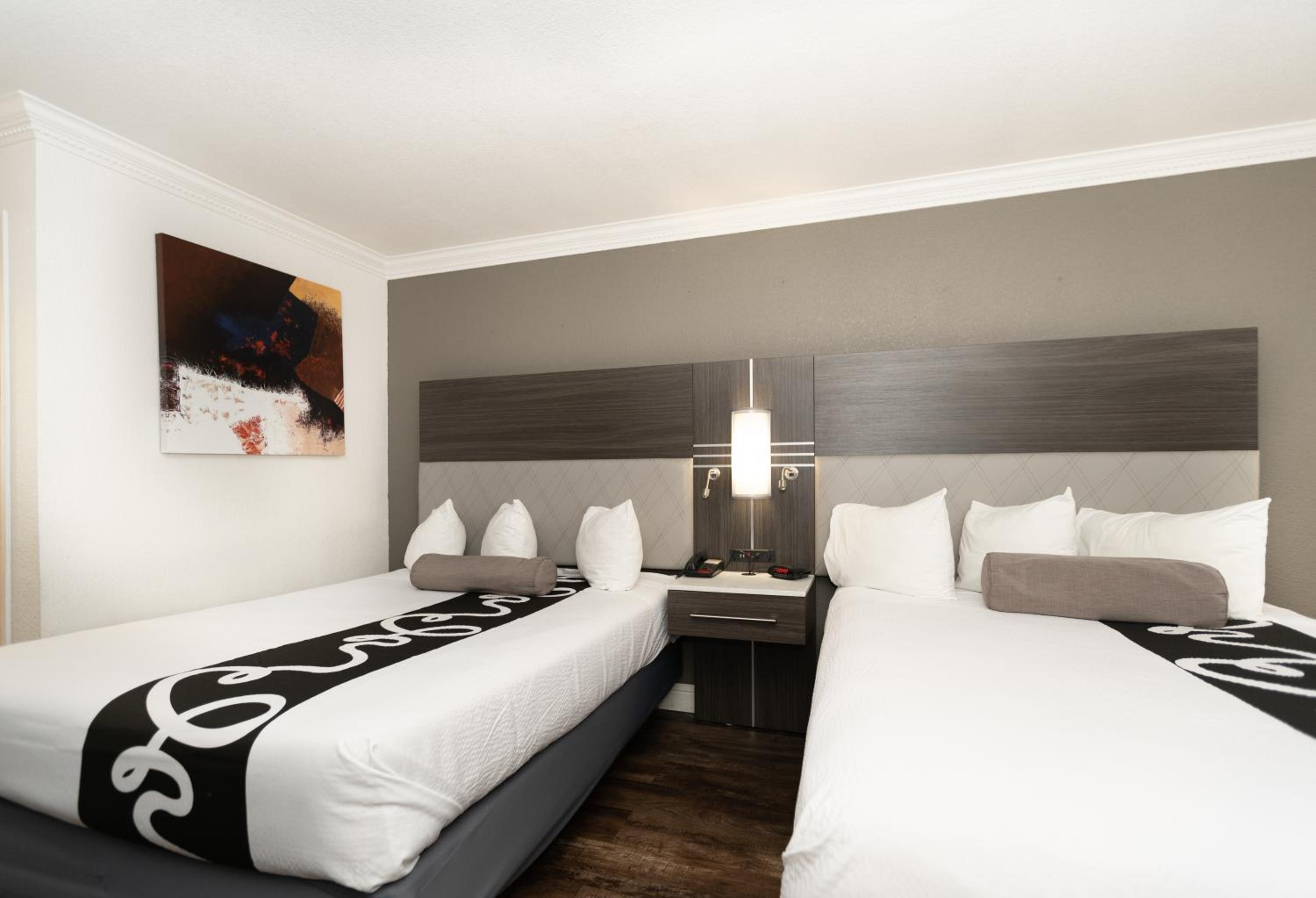 Quadruple Room with Two Queen Beds - Disability Access/Non Smoking photo 1