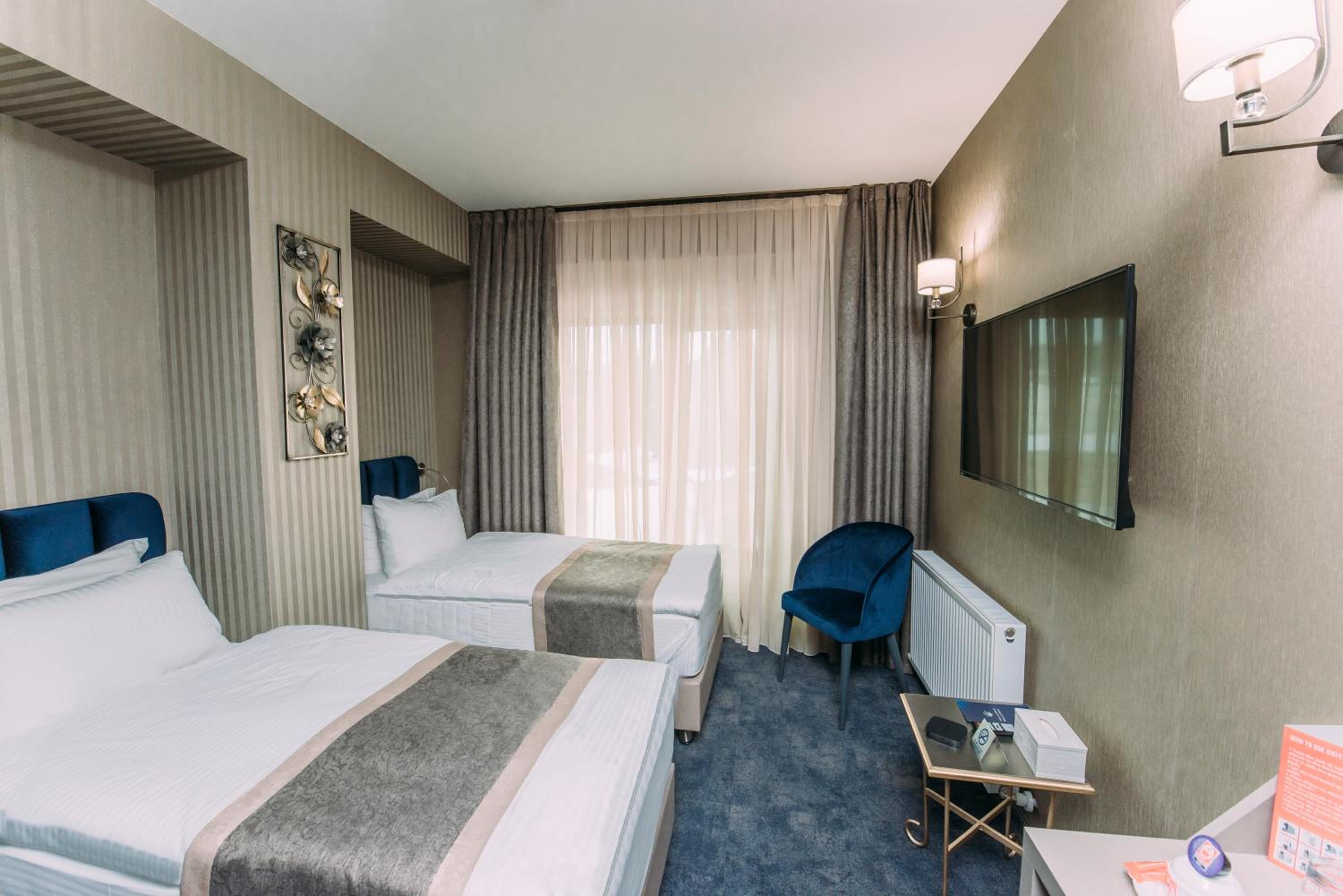 Deluxe Twin Room - Photo 12