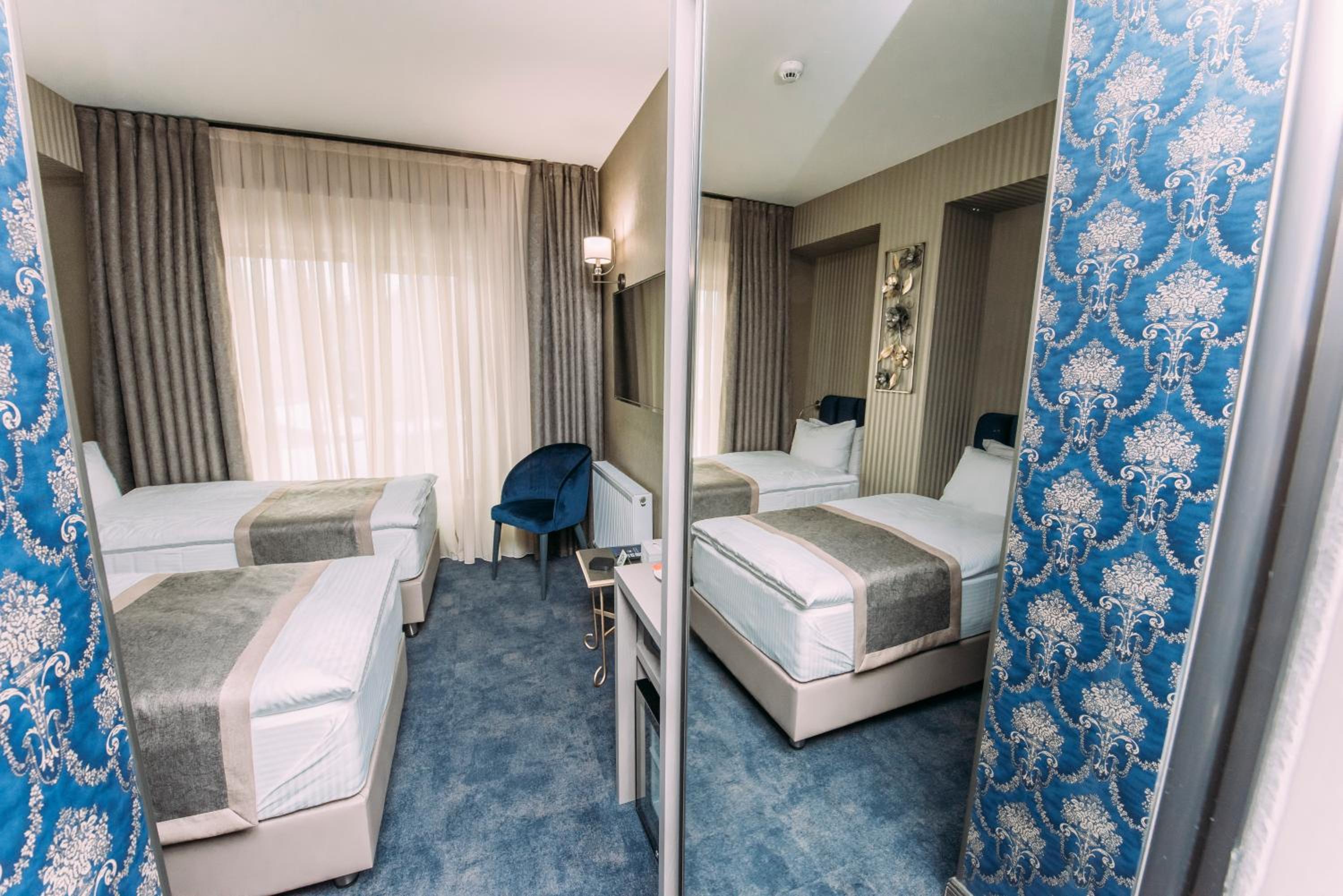 Deluxe Twin Room - Photo 11