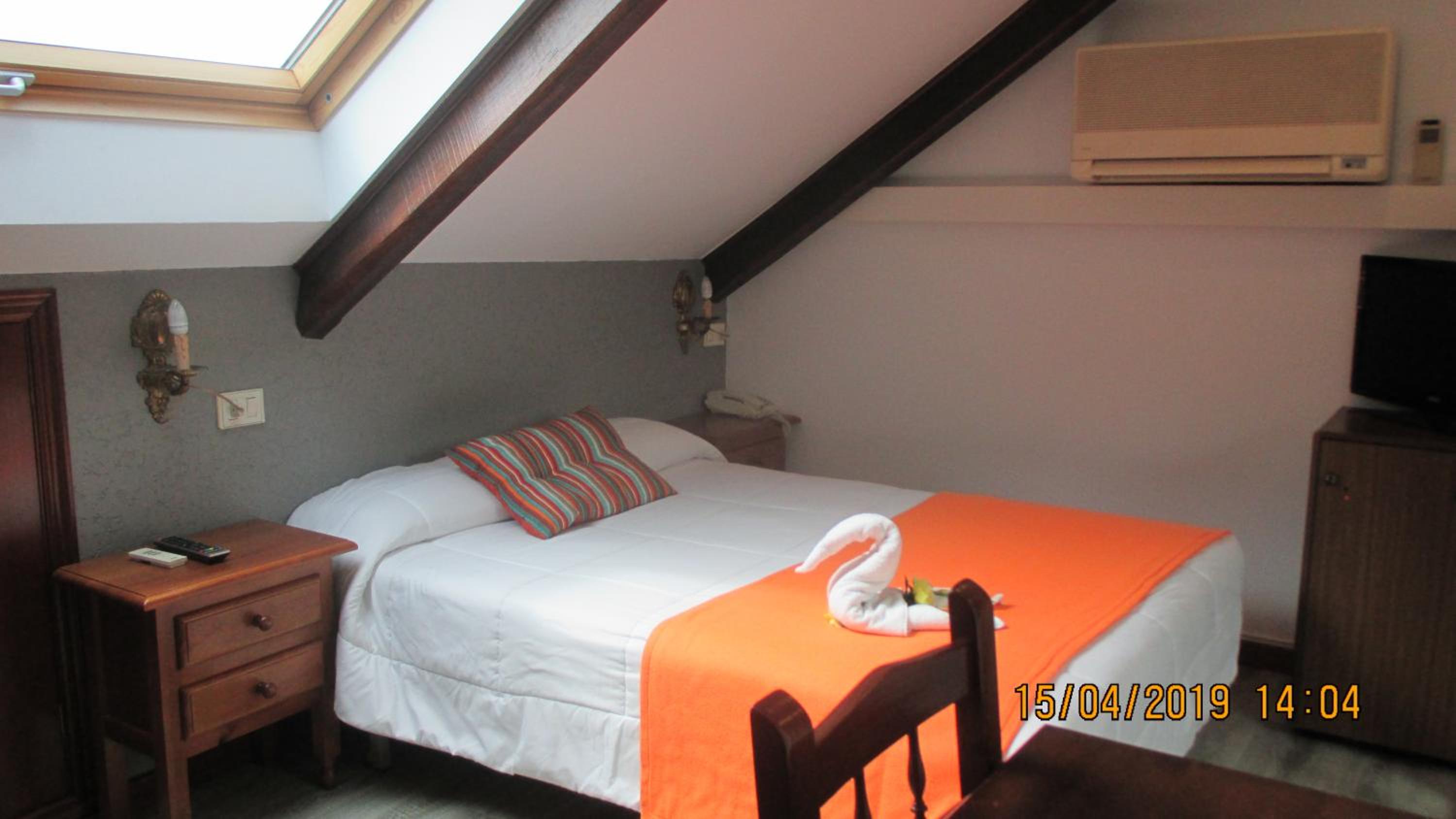 Habitación individual con baño privado y estacionamiento incluido