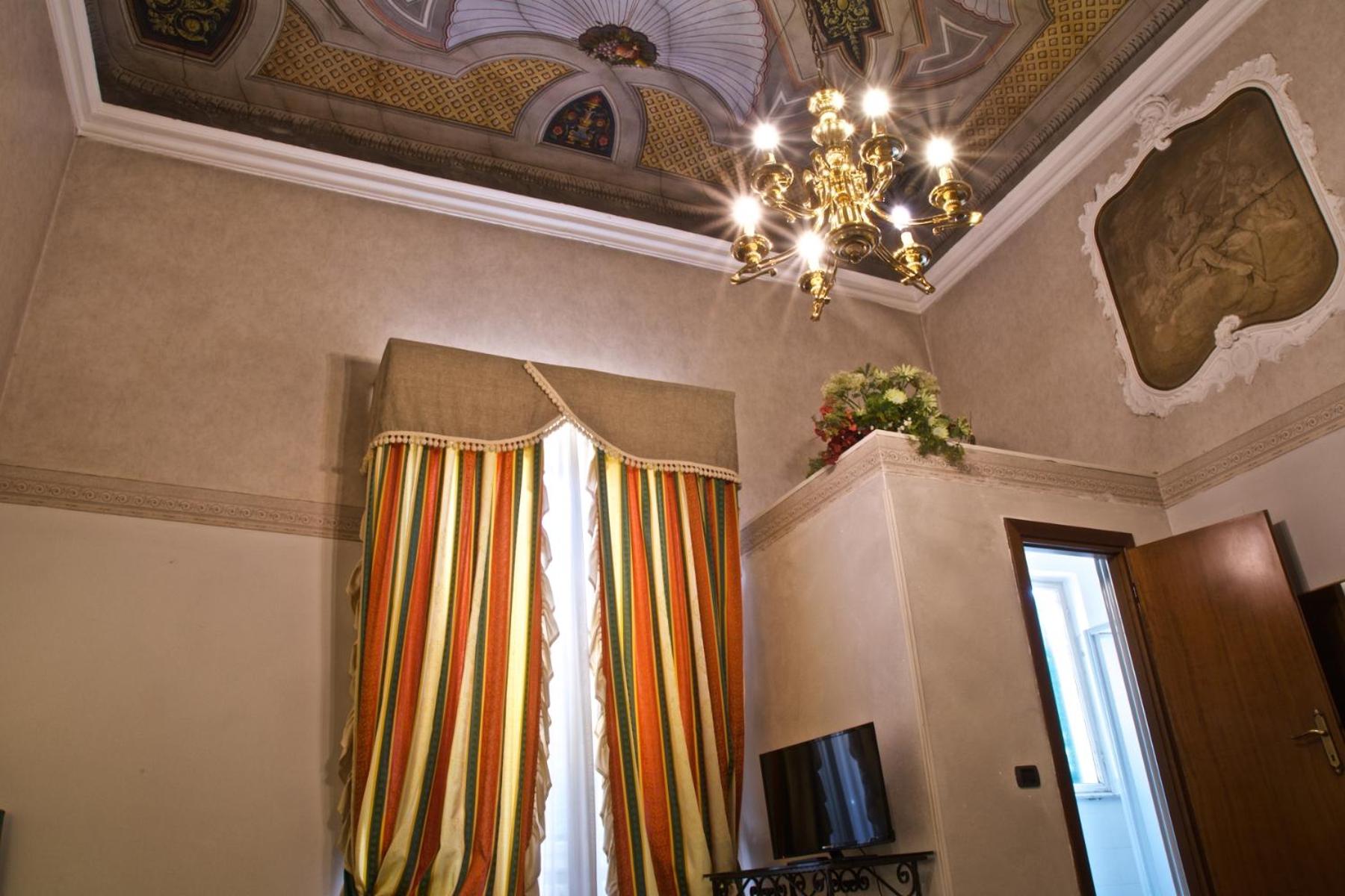 Quadruple Room - Photo 9